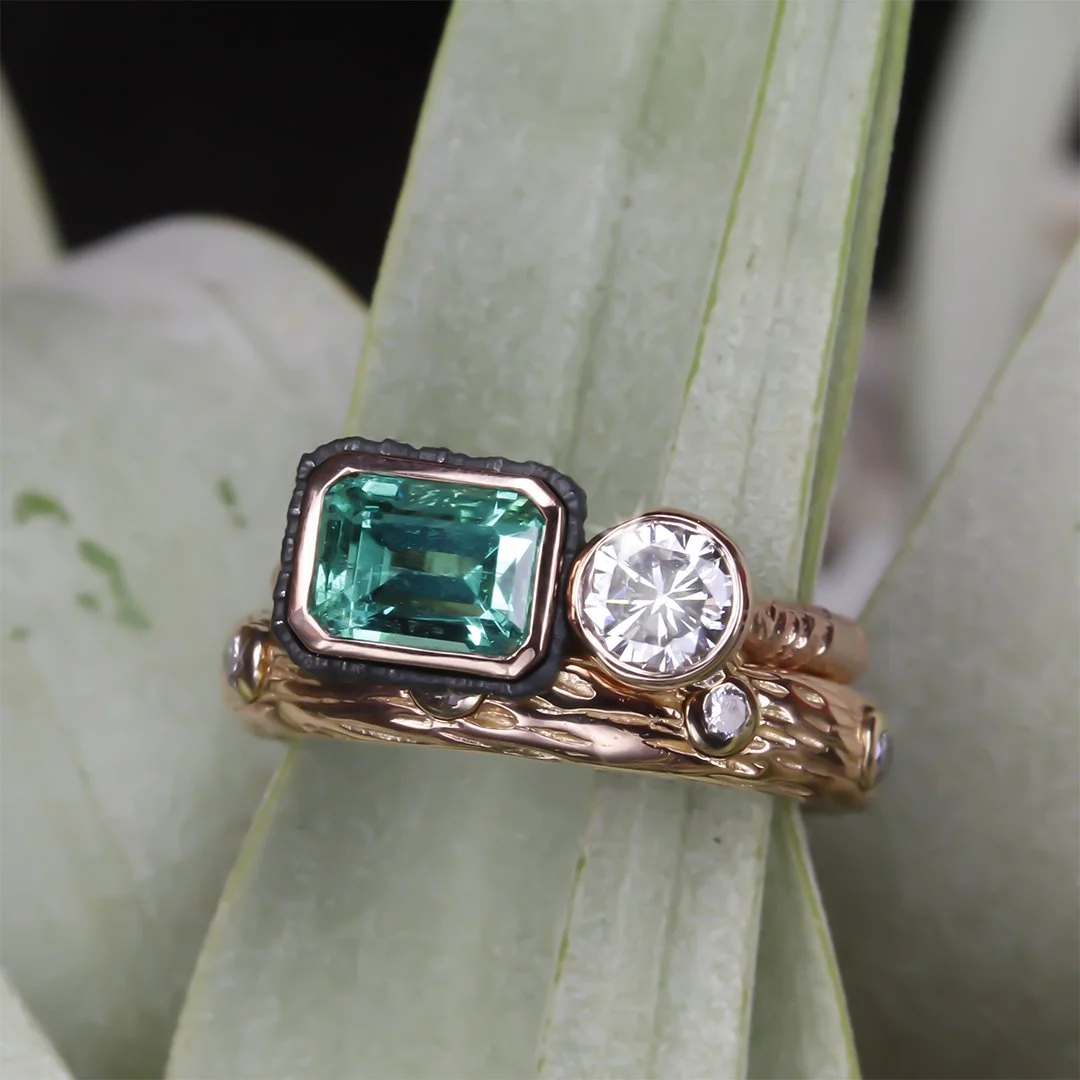 Chroma_ring_two_stone_emerald_dia_rg.jpg