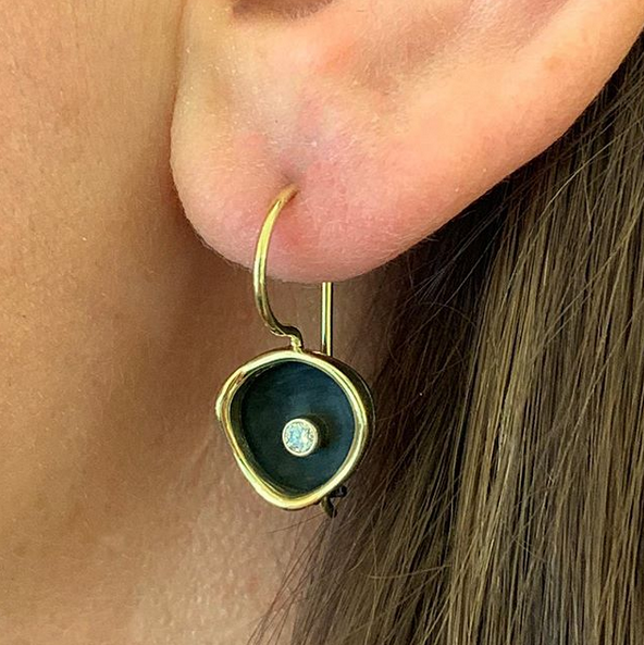 Confluence earring worn.png
