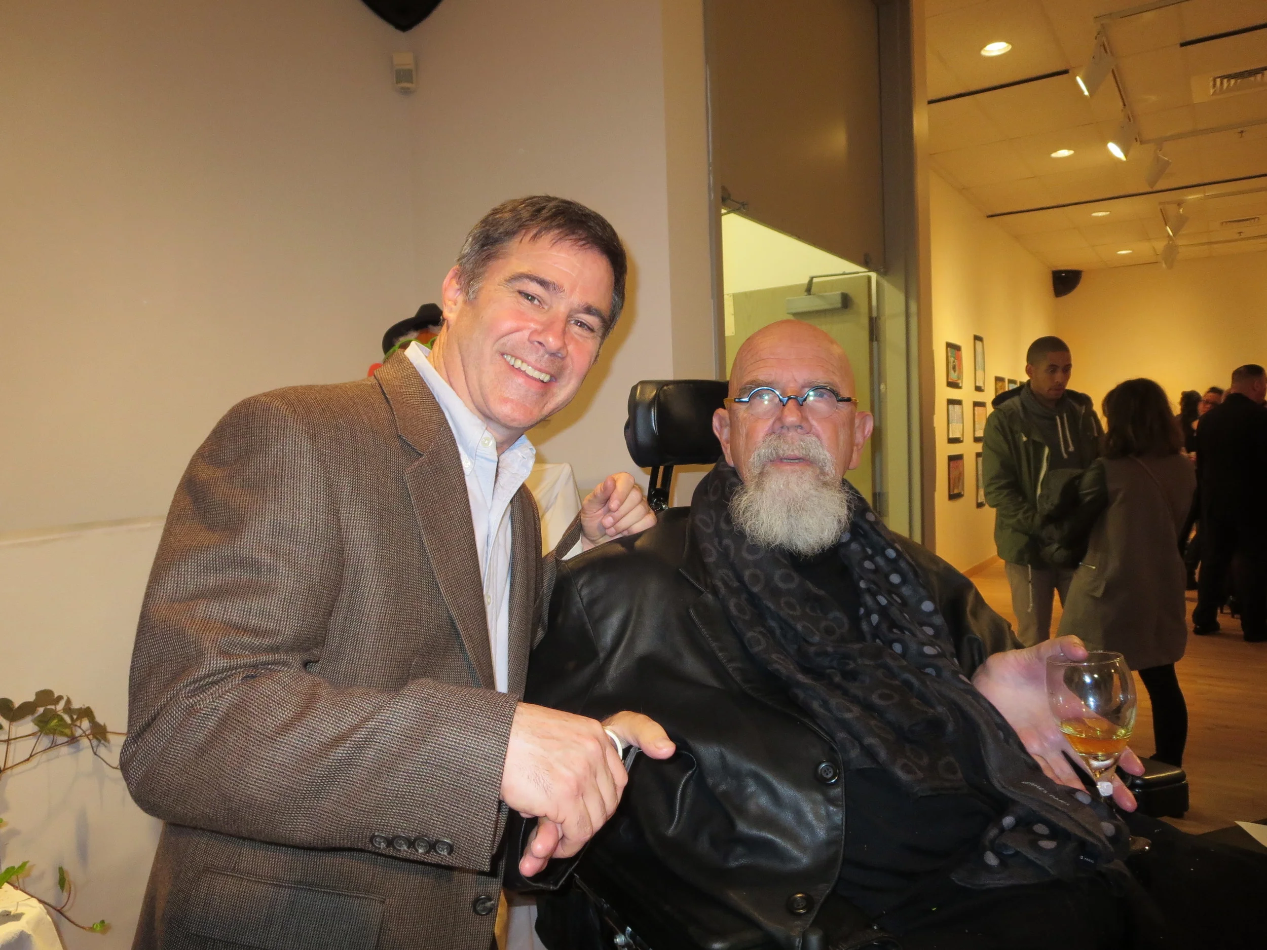 Photo by Sy Hirsch Chuck Close and I at the art opening for the Turnaround Kids Exhibition in the Burt Chernow Gallery during the fall semester of 2013.