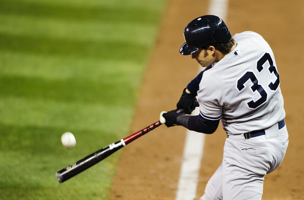  Nick Swisher #33 of the New York Yankees hits a two run home run against the Minnesota Twins during the fourth inning of the game on September 25, 2012 at Target Field in Minneapolis, Minnesota.   (Photo by Hannah Foslien/Getty Images)  