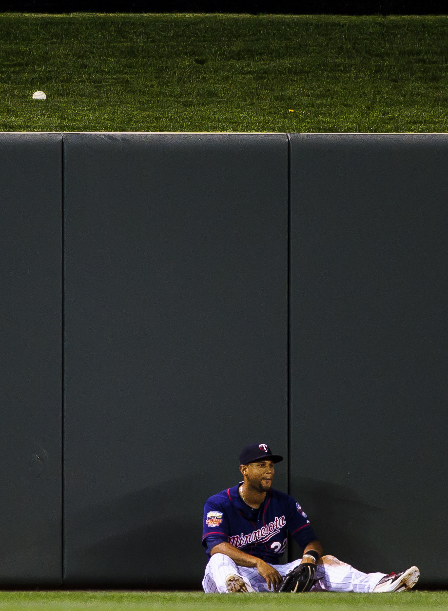  Aaron Hicks #32 of the Minnesota Twins looks on after missing a catch of a solo home run by Matt Dominguez #30 of the Houston Astros during the fourth inning of the game on June 6, 2014 at Target Field in Minneapolis, Minnesota.   (Photo by Hannah F