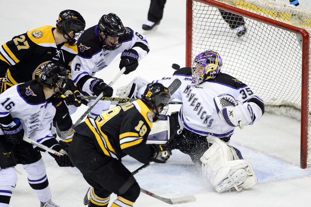  ST PAUL, MN - MARCH 21: The shot by Blake Pietila #19 of Michigan Tech gets past Stephon Williams #35 of Minnesota State during the first period of the 2015 WCHA Final Five hockey championship game on March 21, 2015 at Xcel Energy Center in St Paul,