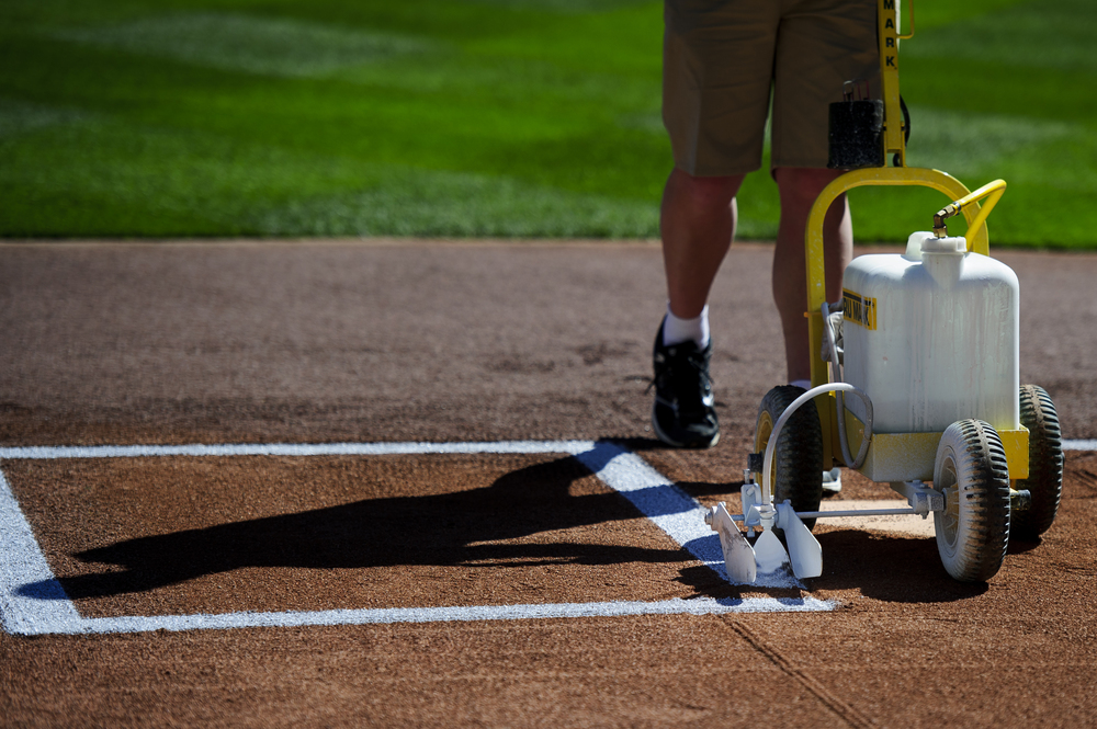  The grounds crew paint a line marking the right handed batters' box before the home opening game between the Minnesota Twins and the Kansas City Royals on April 13, 2015 at Target Field in Minneapolis, Minnesota.   (Photo by Hannah Foslien/Getty Ima