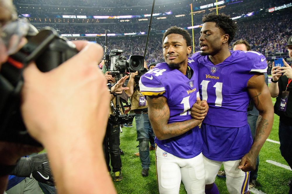  Stefon Diggs #14 and Laquon Treadwell #11 of the Minnesota Vikings react after defeating the New Orleans Saints 29-24 in the NFC Divisional Playoff game on January 14, 2018 at U.S. Bank Stadium in Minneapolis, Minnesota.   (Photo by Hannah Foslien/G