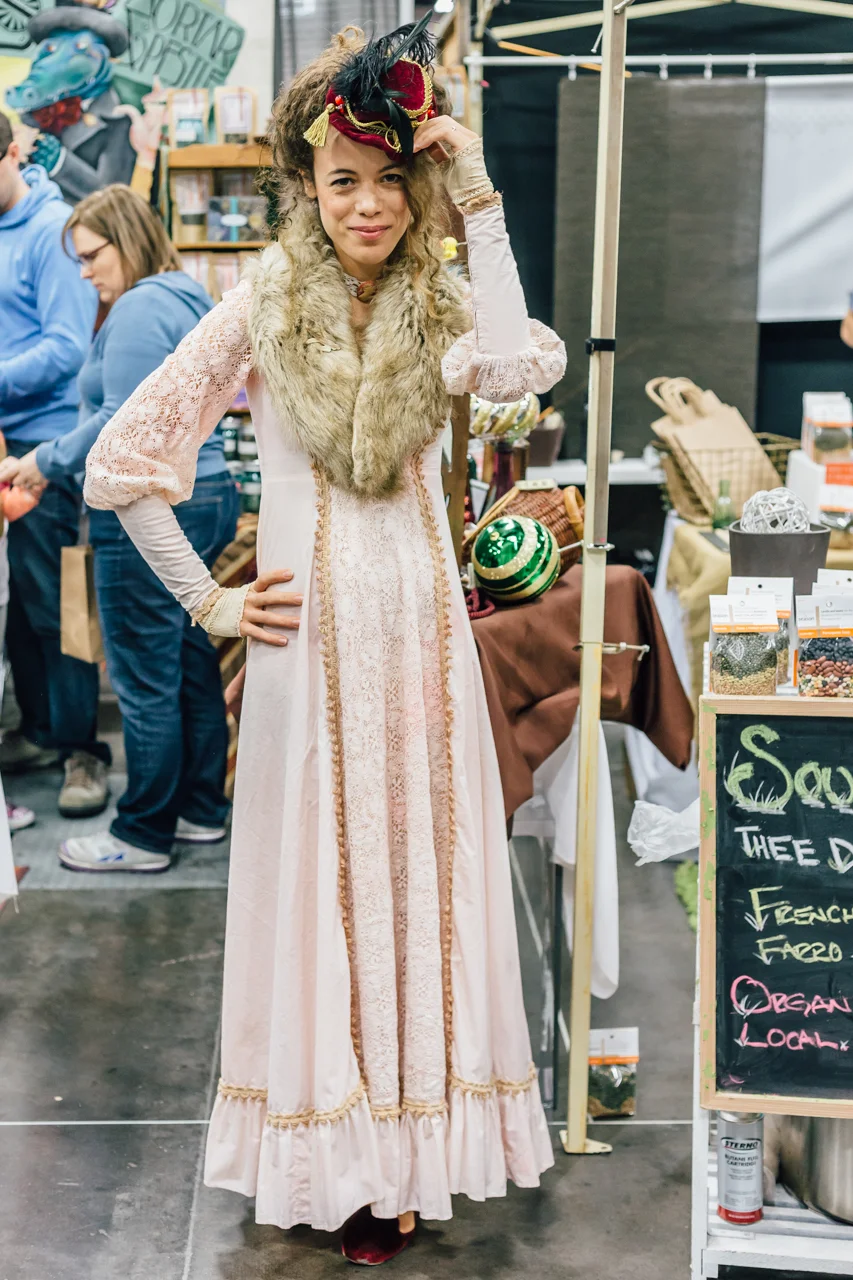 The hat! The dress! The fur! The shoes that match the hat! Head to toe, this lovely lady's old-timey look is fabulous
