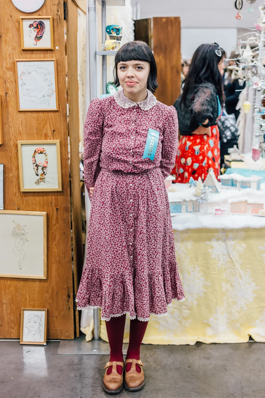 This gal's look reminds me of the previous decade of Portland, when vintage thirft store dresses were all the rage. Kind of a country schoolgirl look, love it!