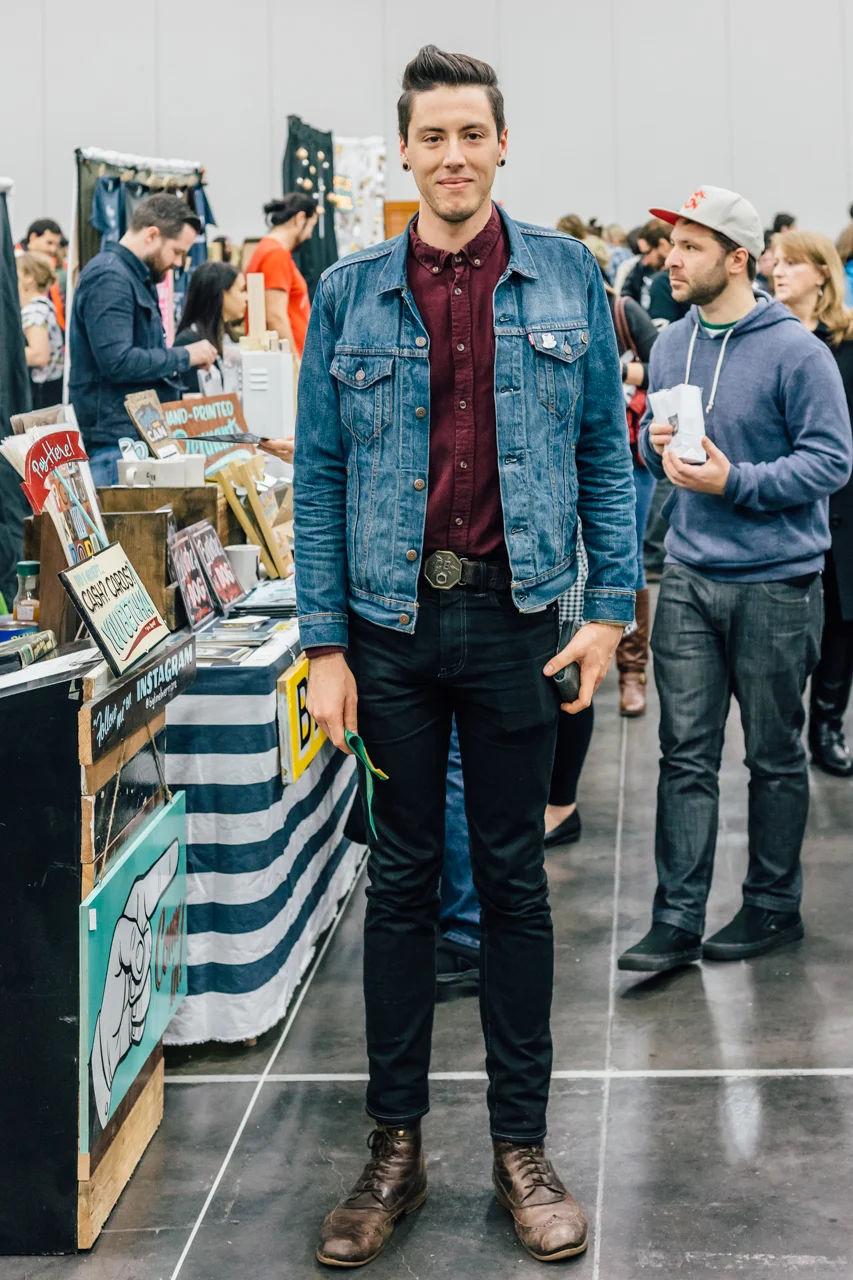 The Portland rocker look - denim, denim, big-ish belt buckle and boots. I bet he's a musician.