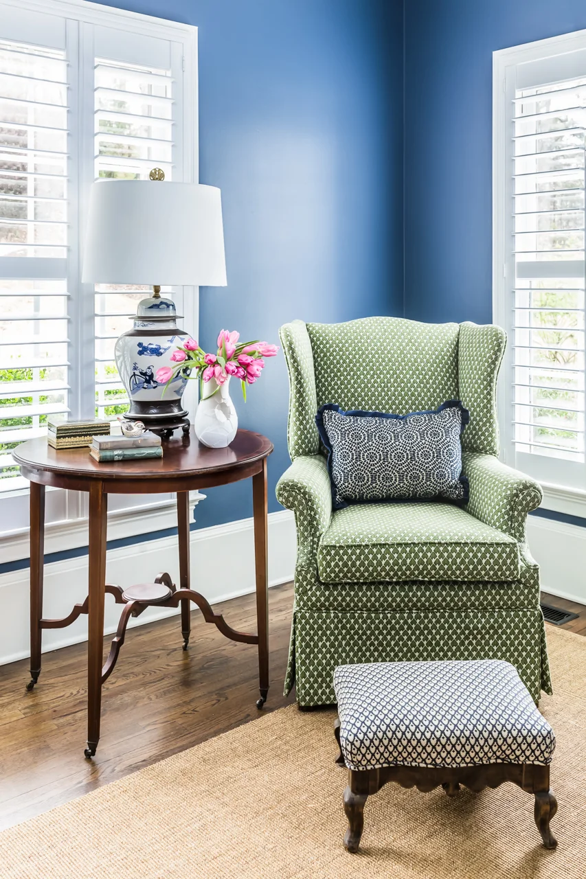 This is a blend of 3 images - 1 to pull the highlights on that lampshade, 1 natural light supplemented with strobes, to get it bright and crisp with the windows where I want them, and a 3rd straight ambient shot to enhance the natural feel.