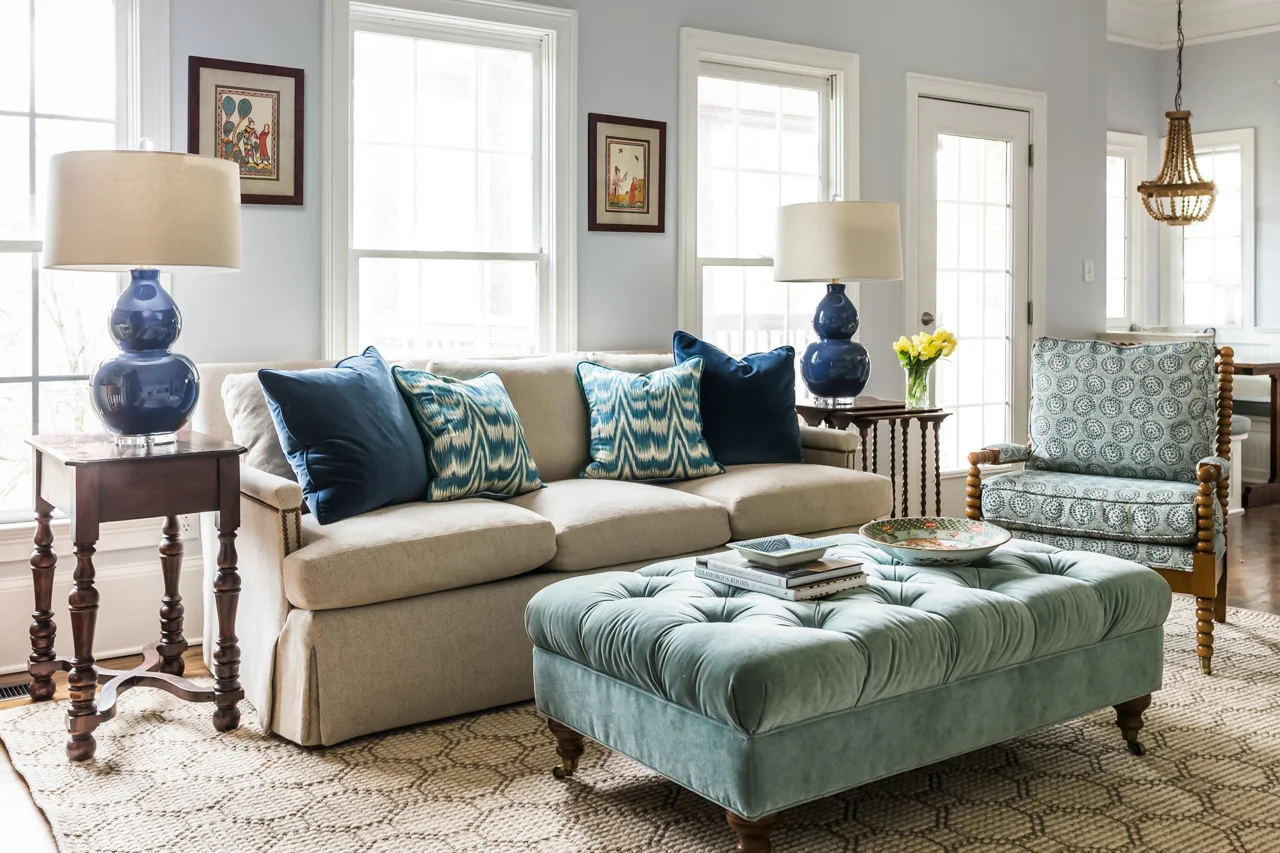 For this image, I lit the main room and back dining nook (behind the chair), blended them with ambient frames, used an additional frame to pull the highlights on the table and lampshade in the foreground, hung the artwork on the wall, and increased the brightness in the windows by a lot so that the window smudges were not visible (the room is on an upper level and windows were not able to be cleaned outside beforehand). I also removed cords and outlets. Total shots used to create this image: 6