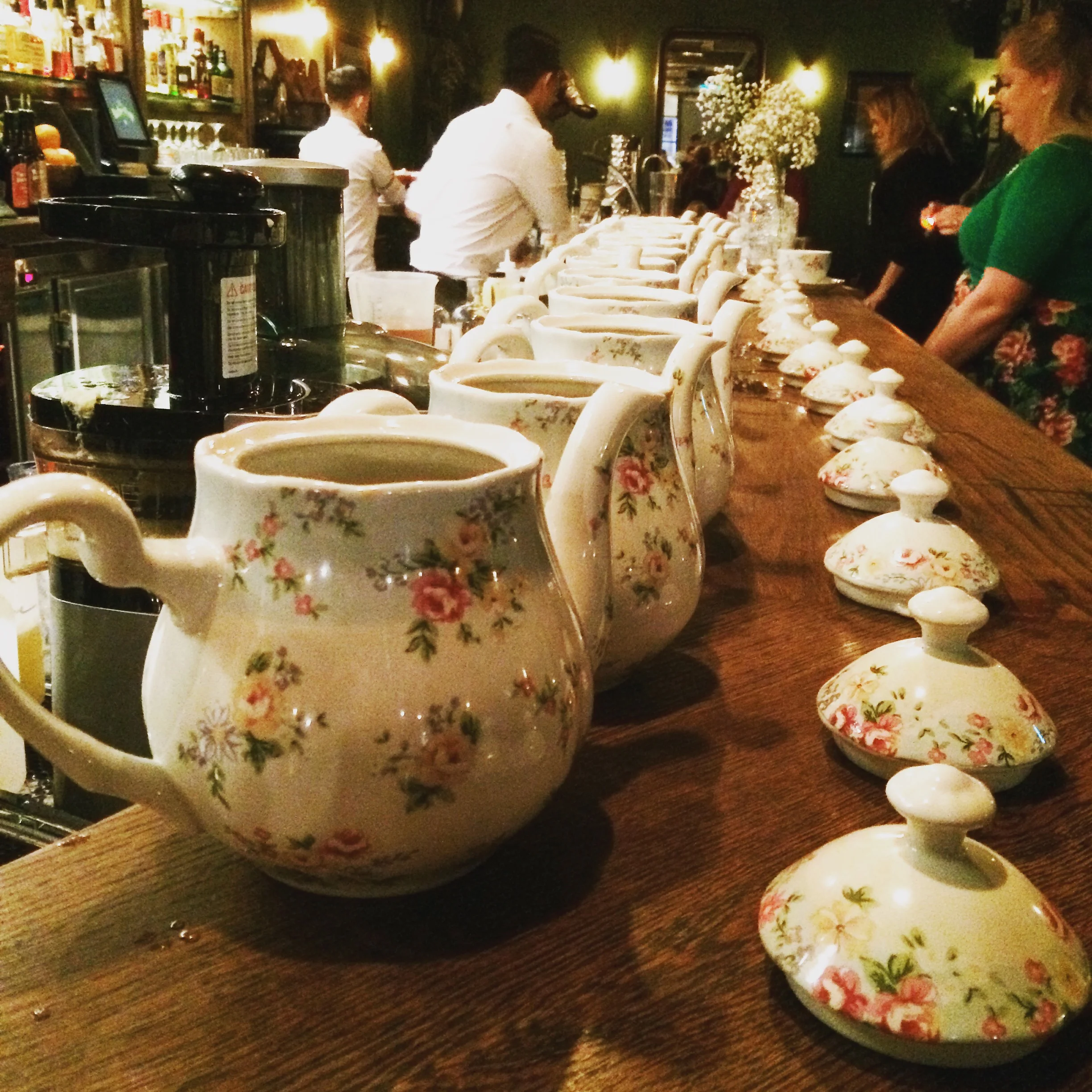 Tipsy teapots all in a row - teapot cocktail with Loch gin, peppermint, green tea and pineapple, which all combined to produce a cocktail tasting like boozed up chamomile tea