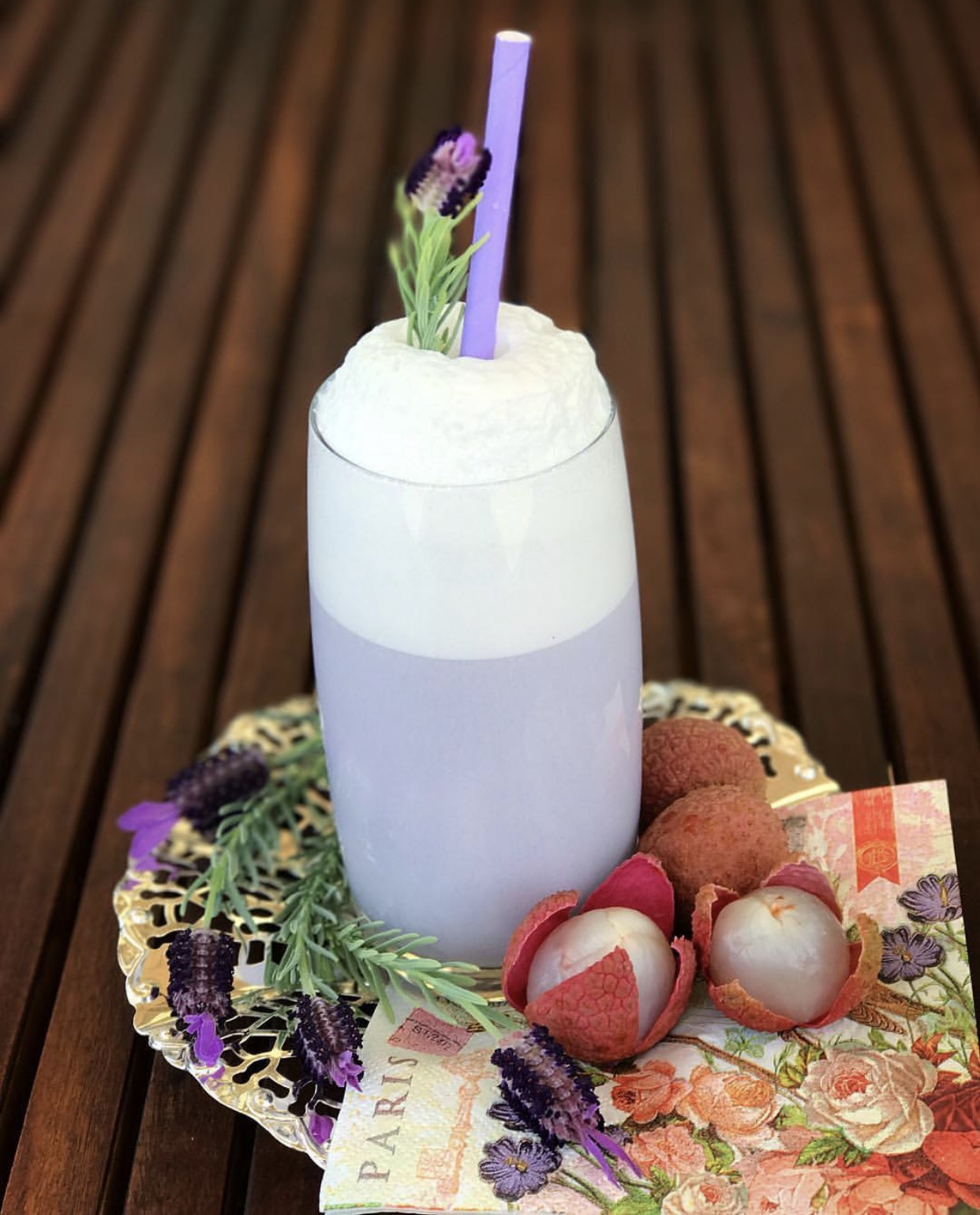Beautiful composition matching an equally beautiful cocktail...all achieved at home but rivalling some of the best cocktail bars we've seen. This one here a fizz made with gin, homemade lychee lavender syrup, lemon juice, cream, butterfly pea extract, egg white and soda water.