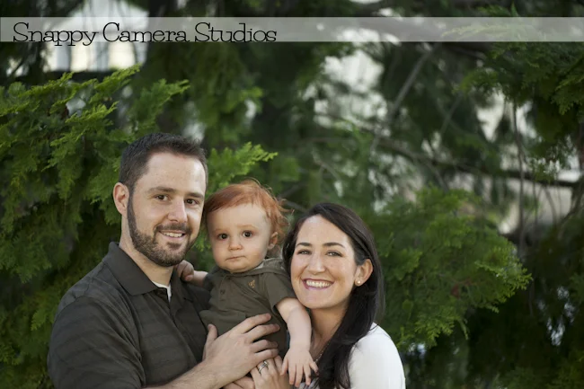 Anthony, Megan, and Declan celebrate a beautiful fall day in Bartholdi Park in Washington, DC.