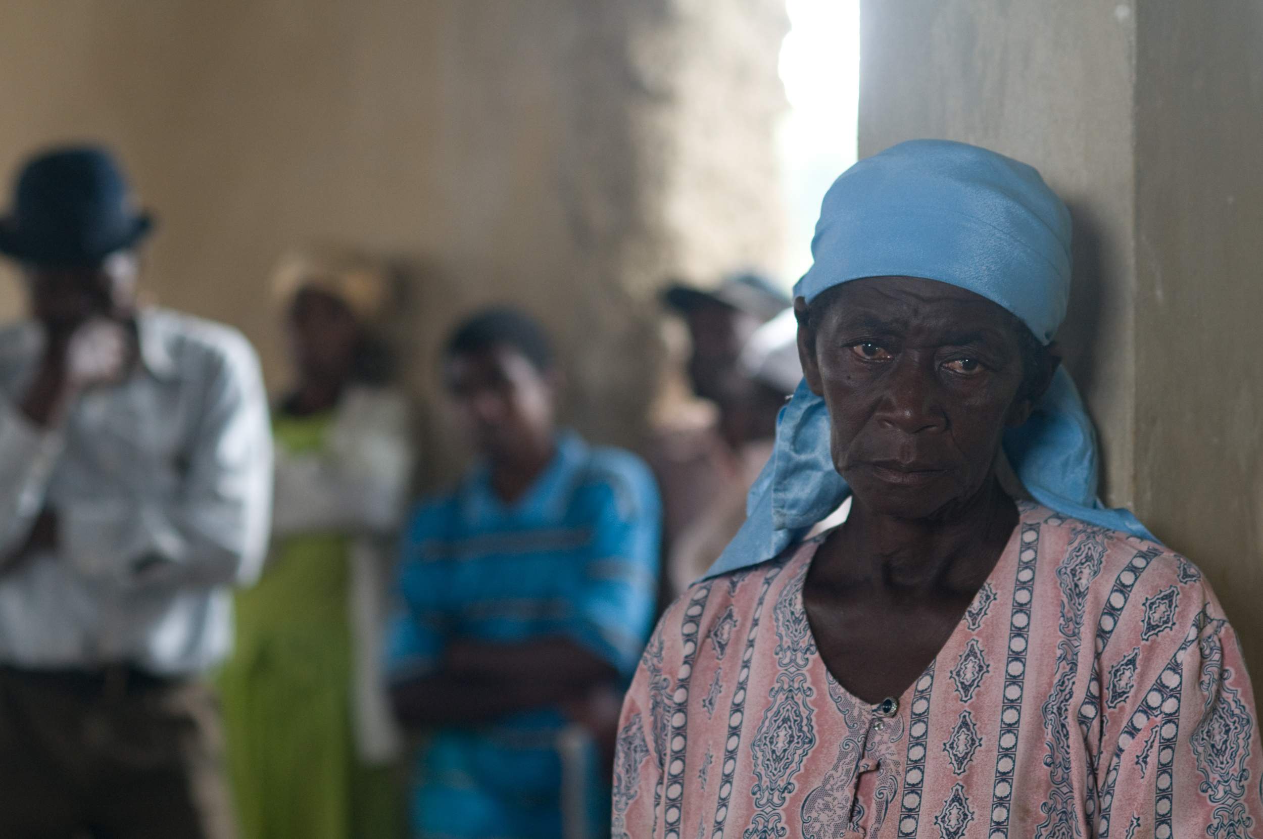 Farmers in Haiti wait in line for money from ACDI-Voca to purchase seeds and prepare their crops for the next year. May 28, 2010. ©2010 Crystaline Randazzo Photography, LLC. All Rights Reserved.