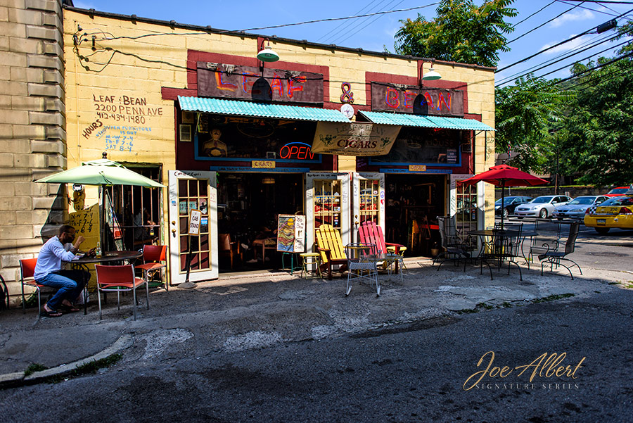 This building was screaming my name! What a colorful place! They sell Tobacco and Coffee! Headed back there today for java!