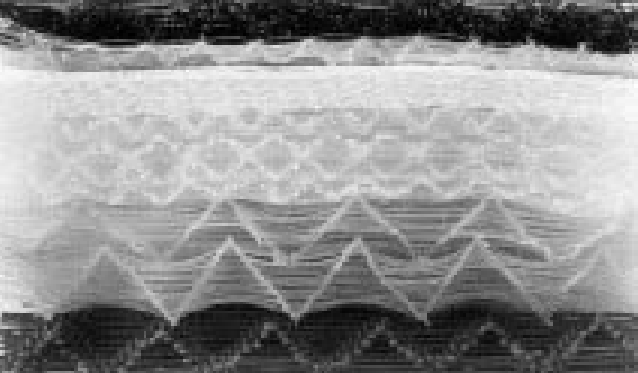 Kimre composite mesh pad cross section showing layers of differing sized filaments for collecting range of mist particle sizes