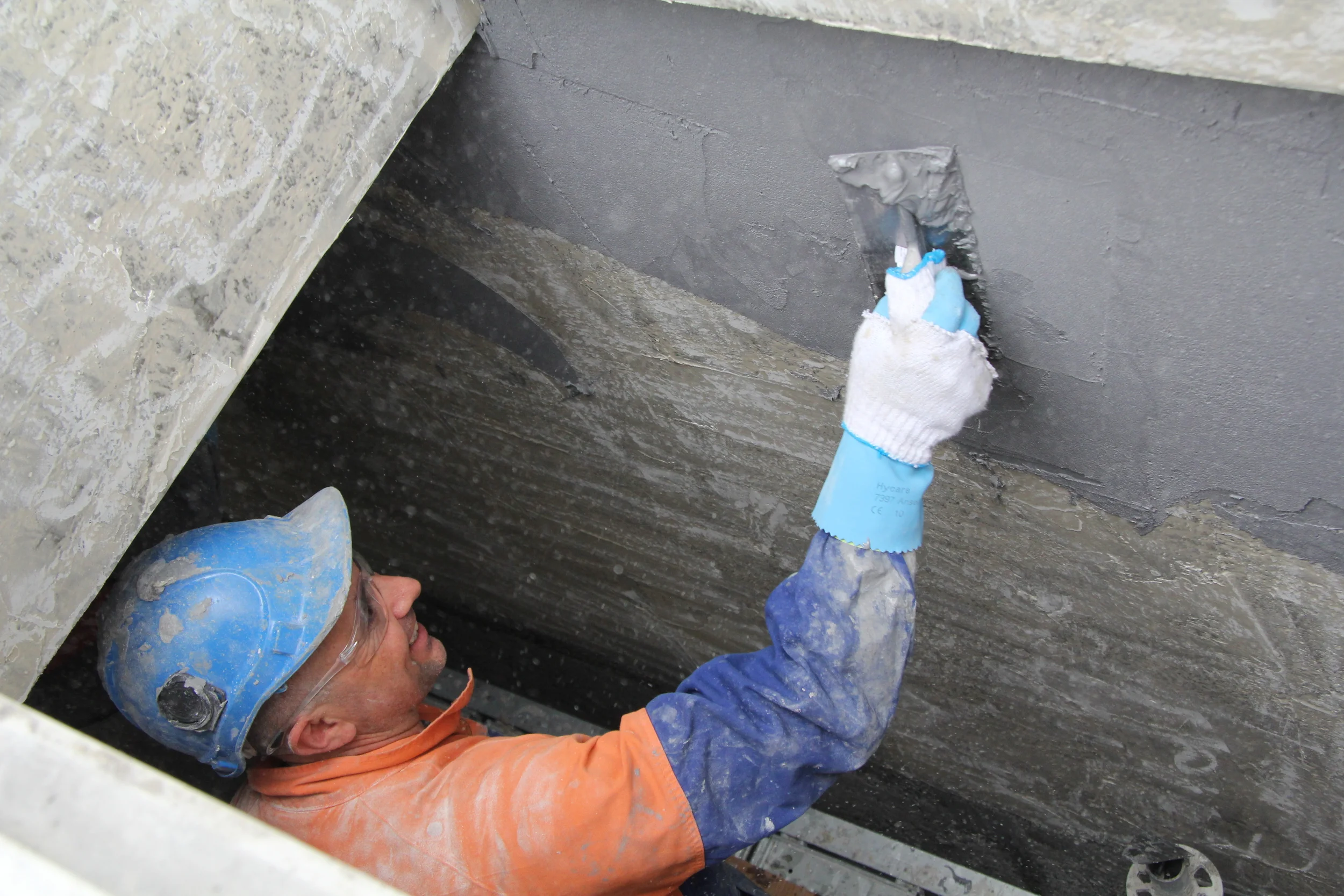 37 Wastewater ChCh PS136TrowelBasecoat1 copy.JPG