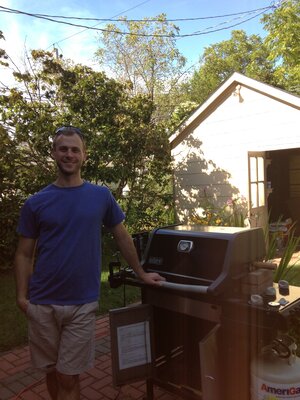 Image of Matt Adams and his weber grill where he first roasted coffee in.
