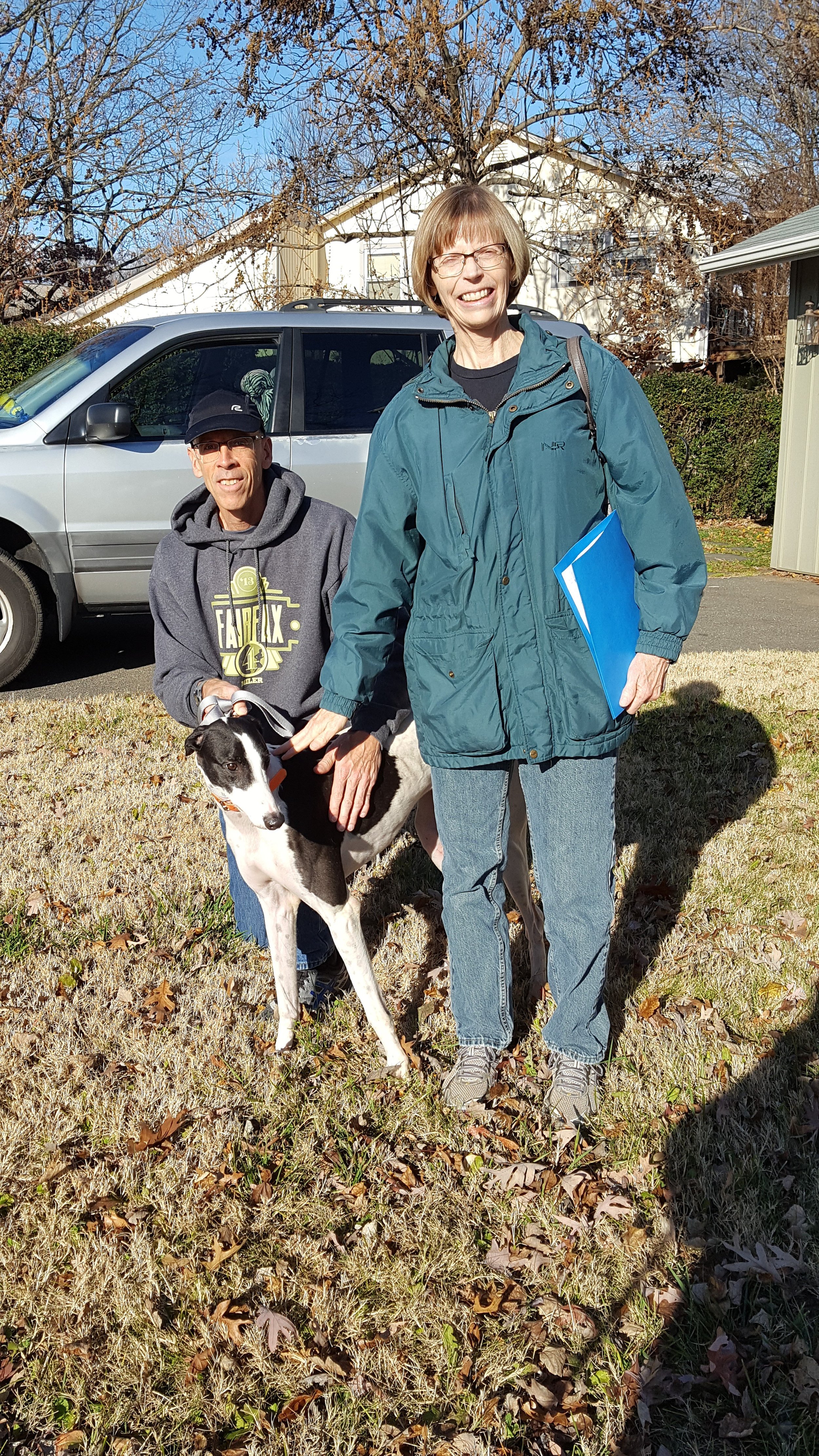 Santa's sleigh was a white dually truck trailering a hauler and "Santa" wasn't wearing a red suit but Rizzo didn't care......she was on her way with all her friends to meet her new family! She wished they had stopped so she could get a bow....she was going to be an awesome present for her new family. She couldn't wait...a family all her own...her wish had finally come true! Nancy and Roger were suffering from an empty greyhound house and couldn't wait to fill it again with greyhound love and noses. They couldn't wait to spoil the little girl they had heard so much about......and the time was finally here.