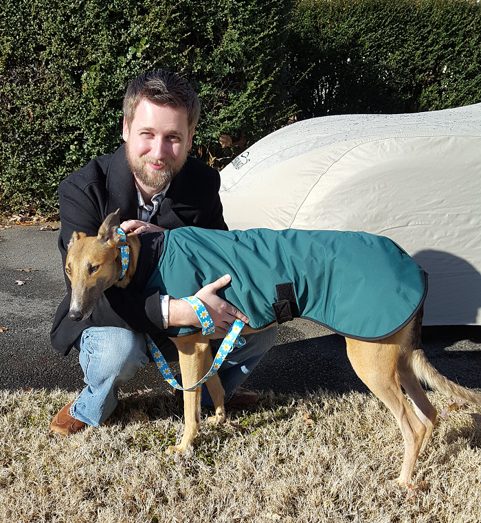 Brian adopted CT Bond Girl, now called Daisy. she is a beautiful dark red with black girl that has lots of energy and even jumped up and gave Brian a kiss!