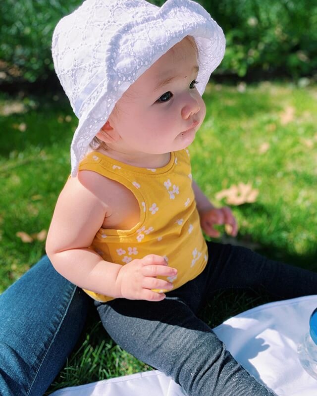 Like father, like daughter; someone refuses to look directly at the camera.