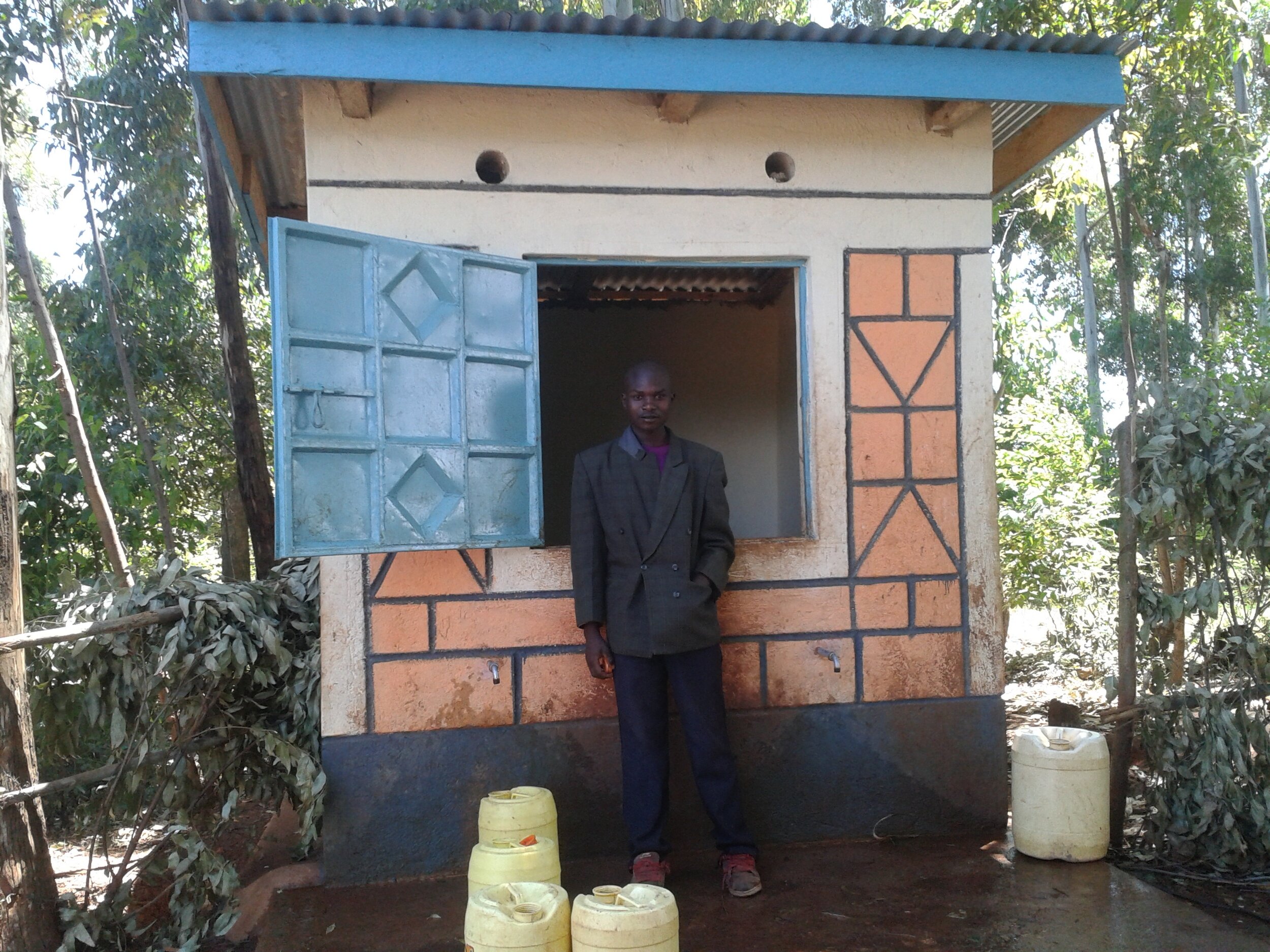 mwoa water  kiosk project in use.JPG