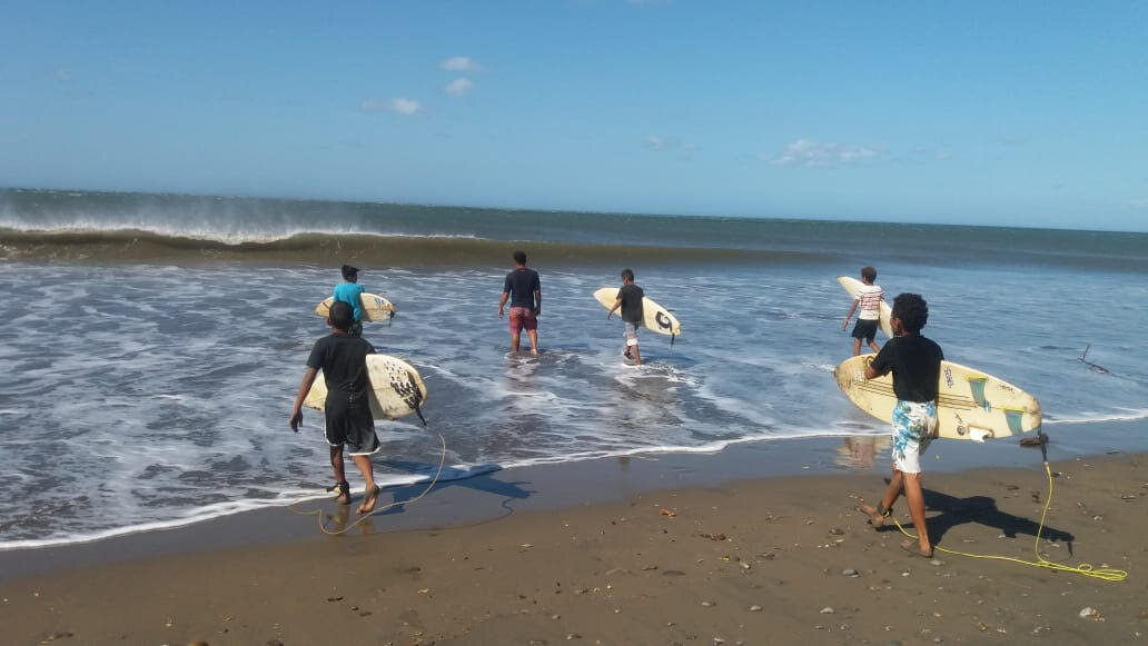  Surf lesson for local kids 