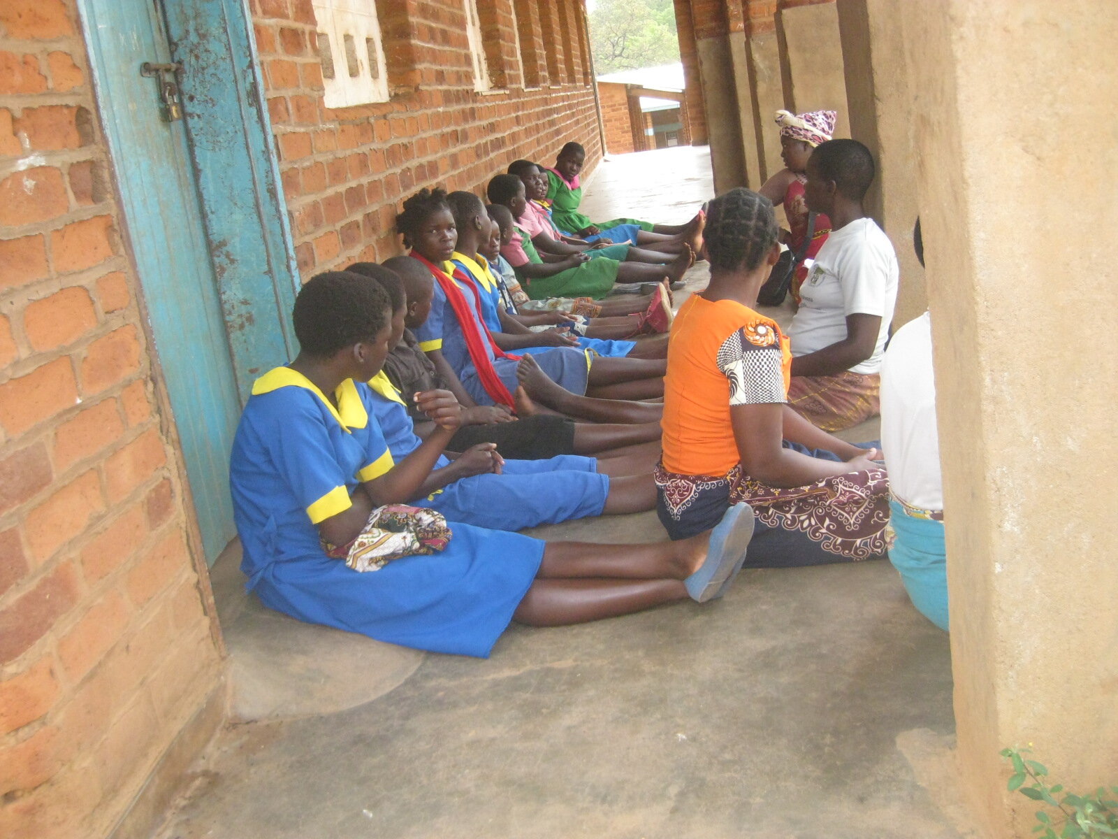 Project Officer Bridget Nkomo engaging adolescence girls on SRHR.JPG