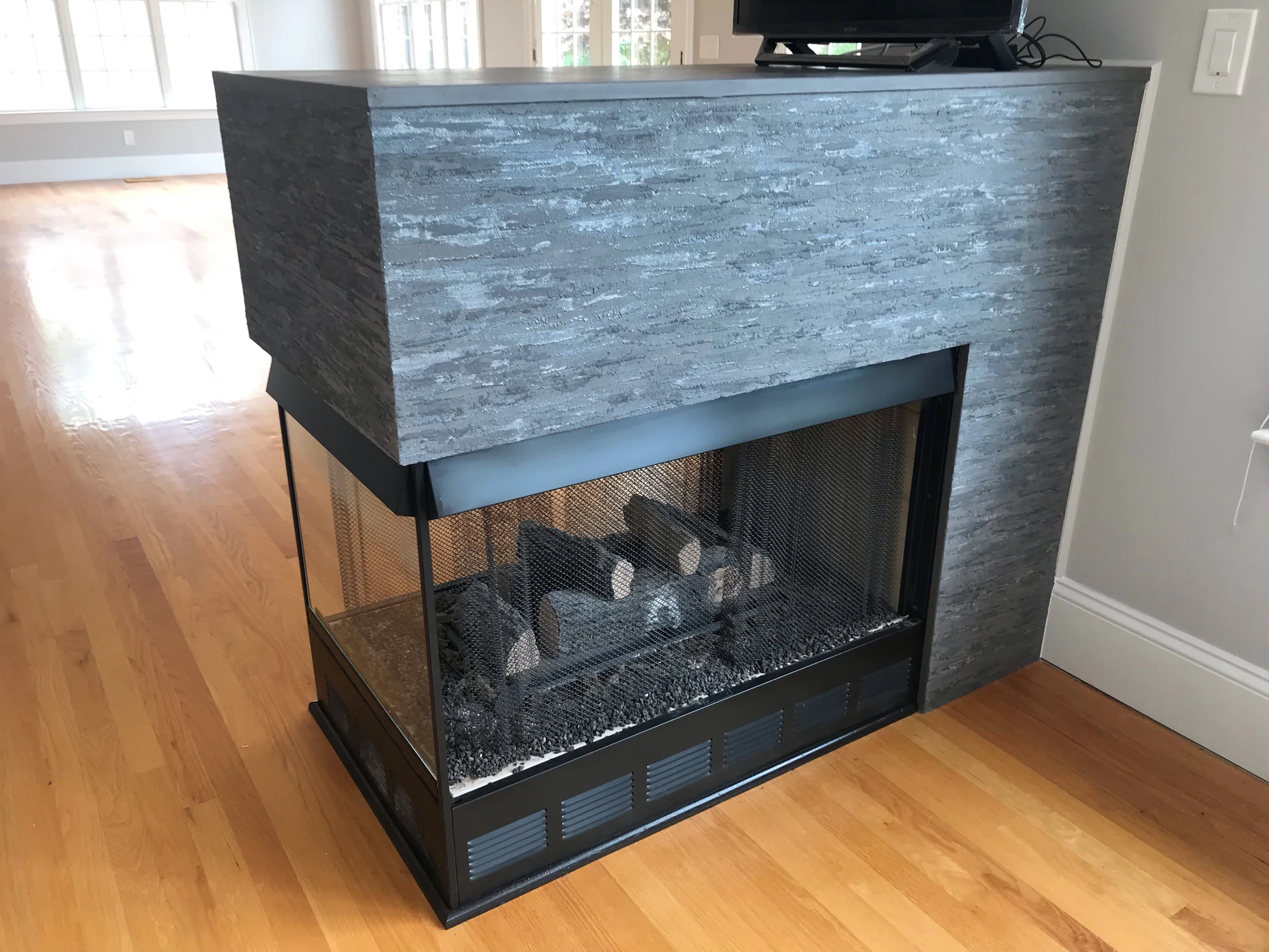 Contemporary Plaster Fireplace Makeover