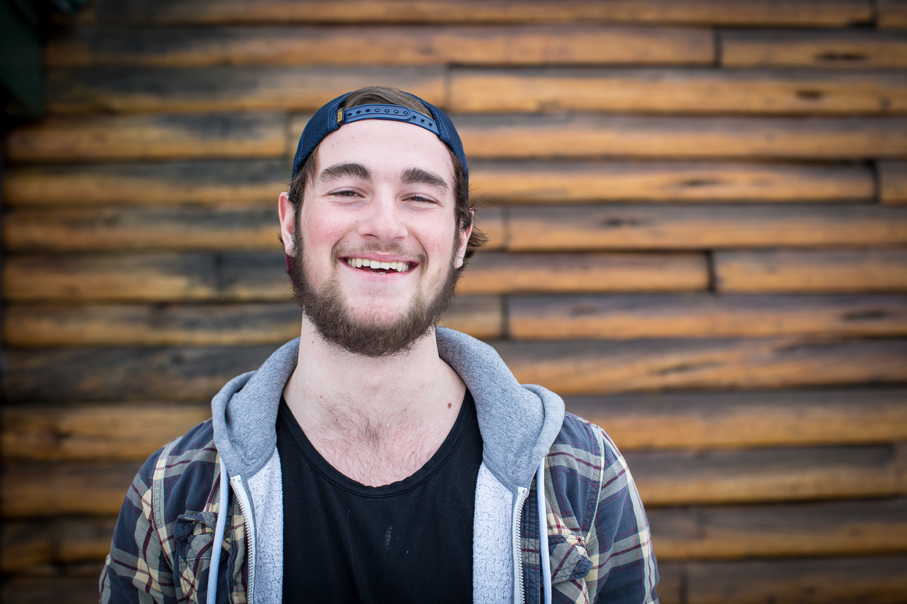 Ashley Barker Photography British Columbia Calum Petit Lodge Plaid Trucker Hat Wood Beard Happy Powder