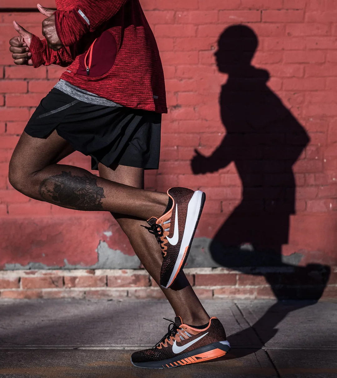 Ashley Barker Everyday PPL Nike New York Brick Wall Shadows Running Red Shoes Zoomed