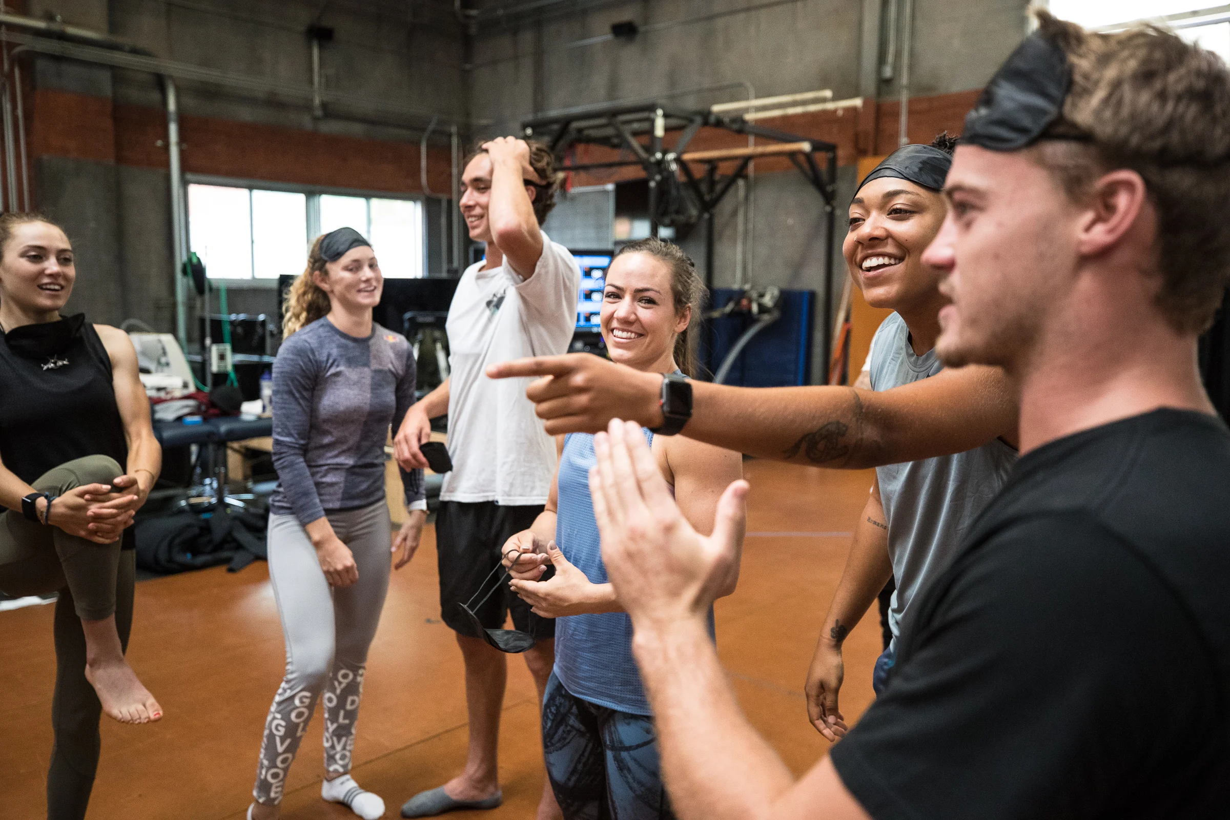 Participants smile during Cirque du Soliel training portion of Performing Under Pressure at Redbull HQ Gym in Santa Monica on October 3 2018