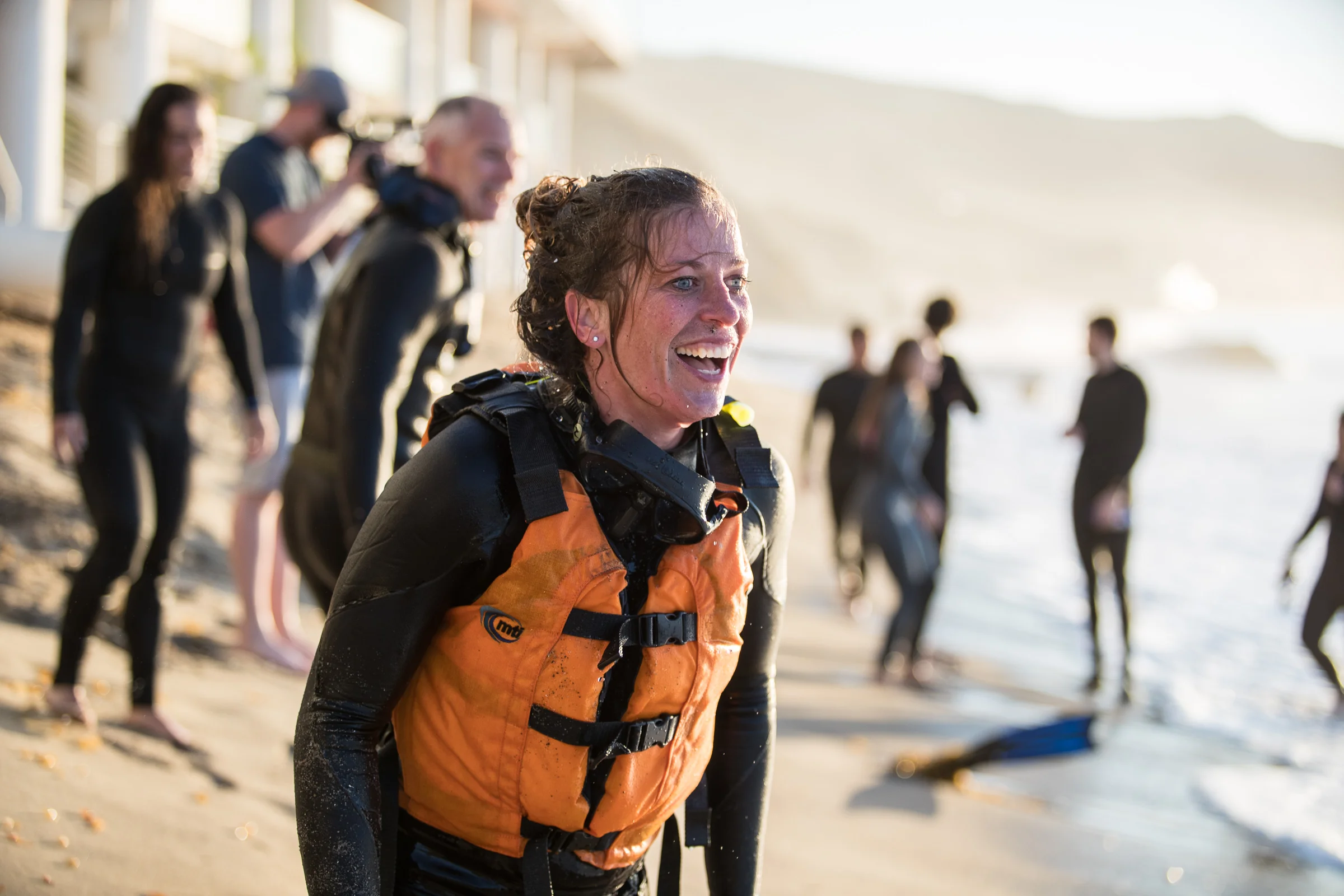Jill Kintner smiles after completing a Seal training exercise during Performing Under Pressure, on a beach in Malibu, California October 5 2018