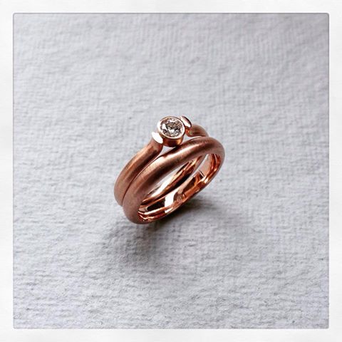 Bespoke 9ct red gold engagement and wedding ring matching set
