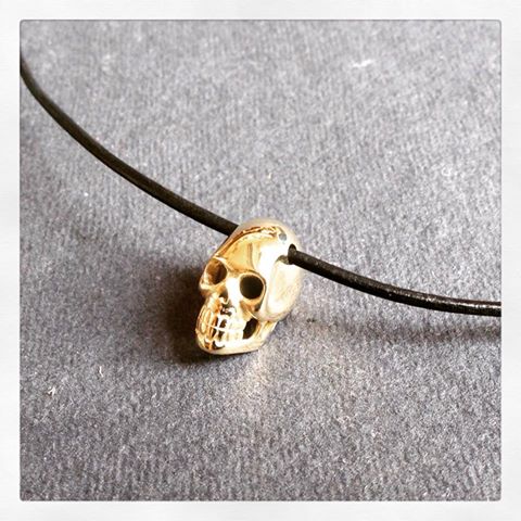 Unique bespoke, gold skull pendant