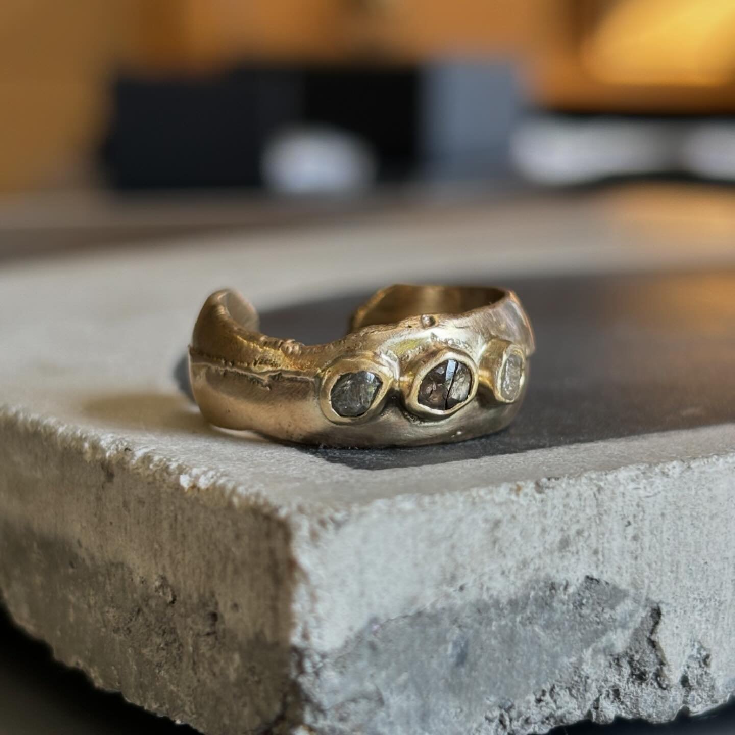 Made for one of my best pals, this raw diamond ring was sand cast in house using scrap gold and diamonds she had already. I wanted to let the cast determine the design, so the seam and incomplete edges have been left untouched. I described it to my f