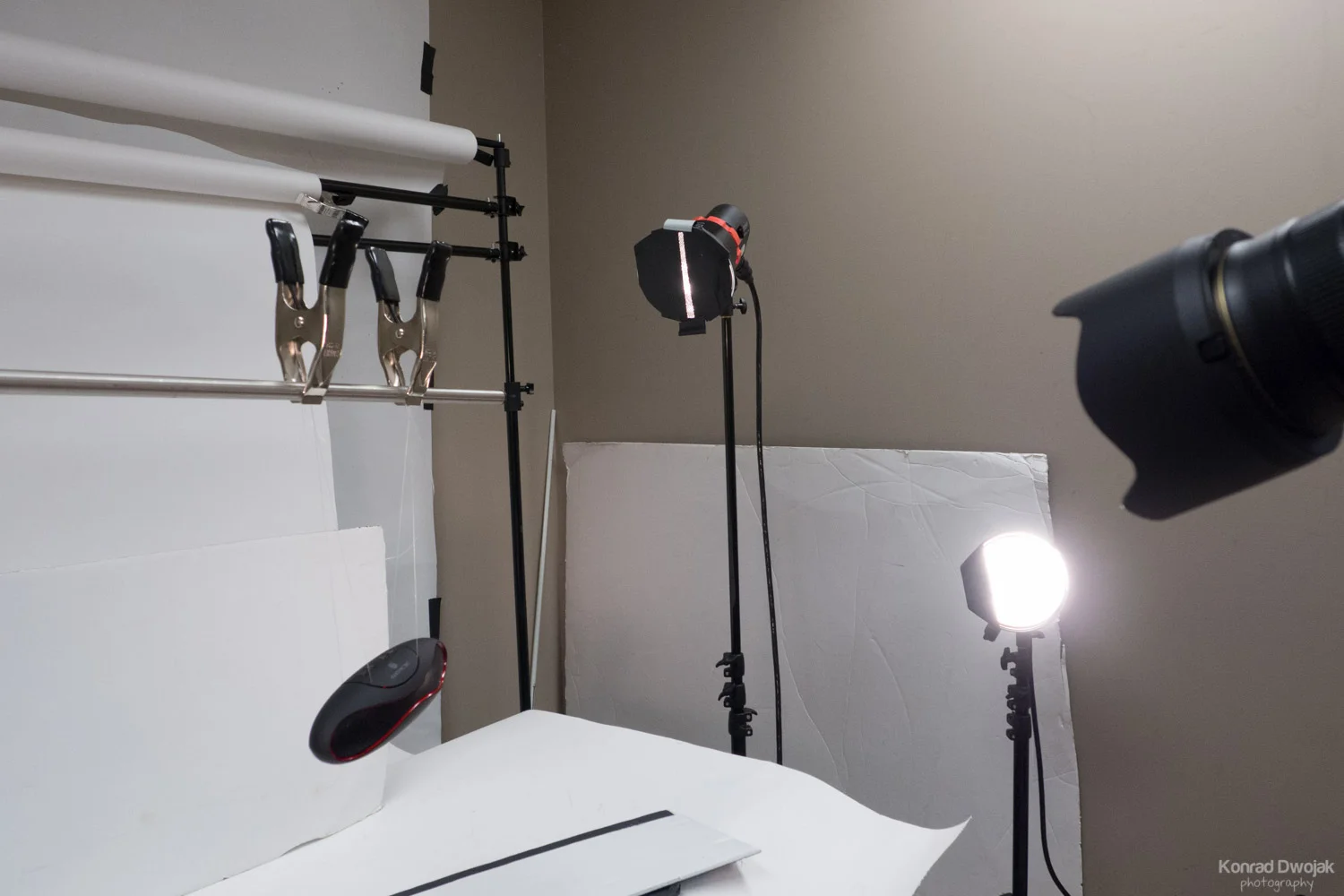 Two flash heads on the right side with honeycomb grids and gaffer tape for smaller light source and better light control.