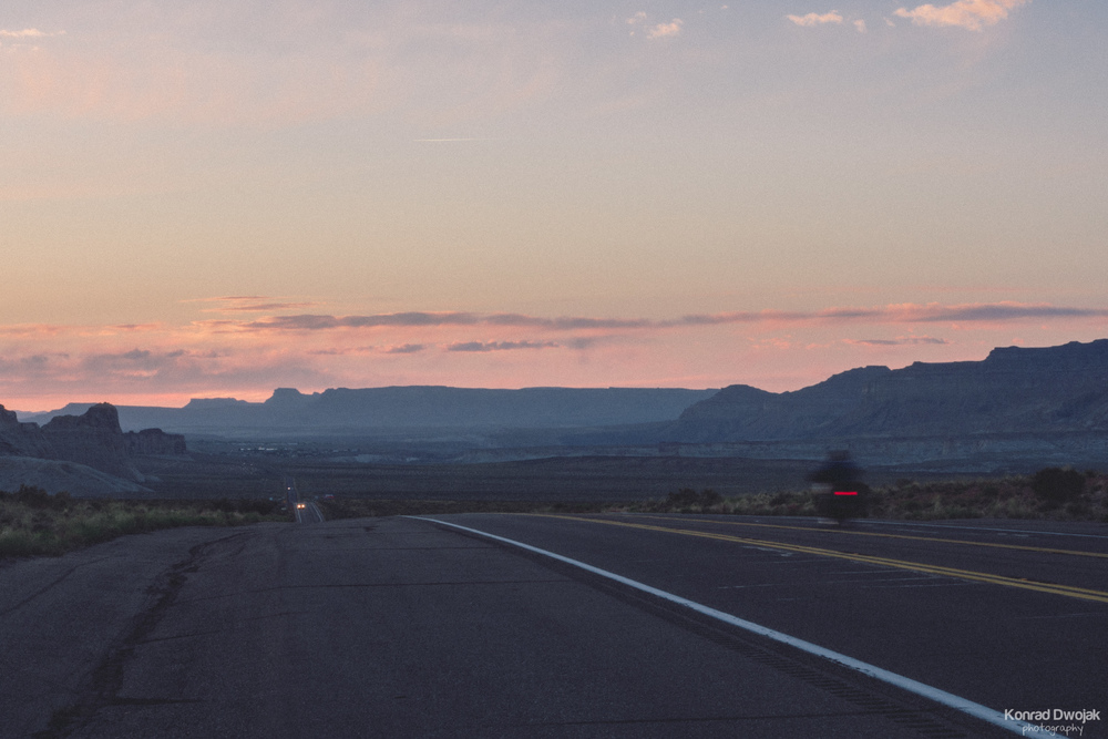 Sunset and Road Trip Travellers near Big Water, Utah