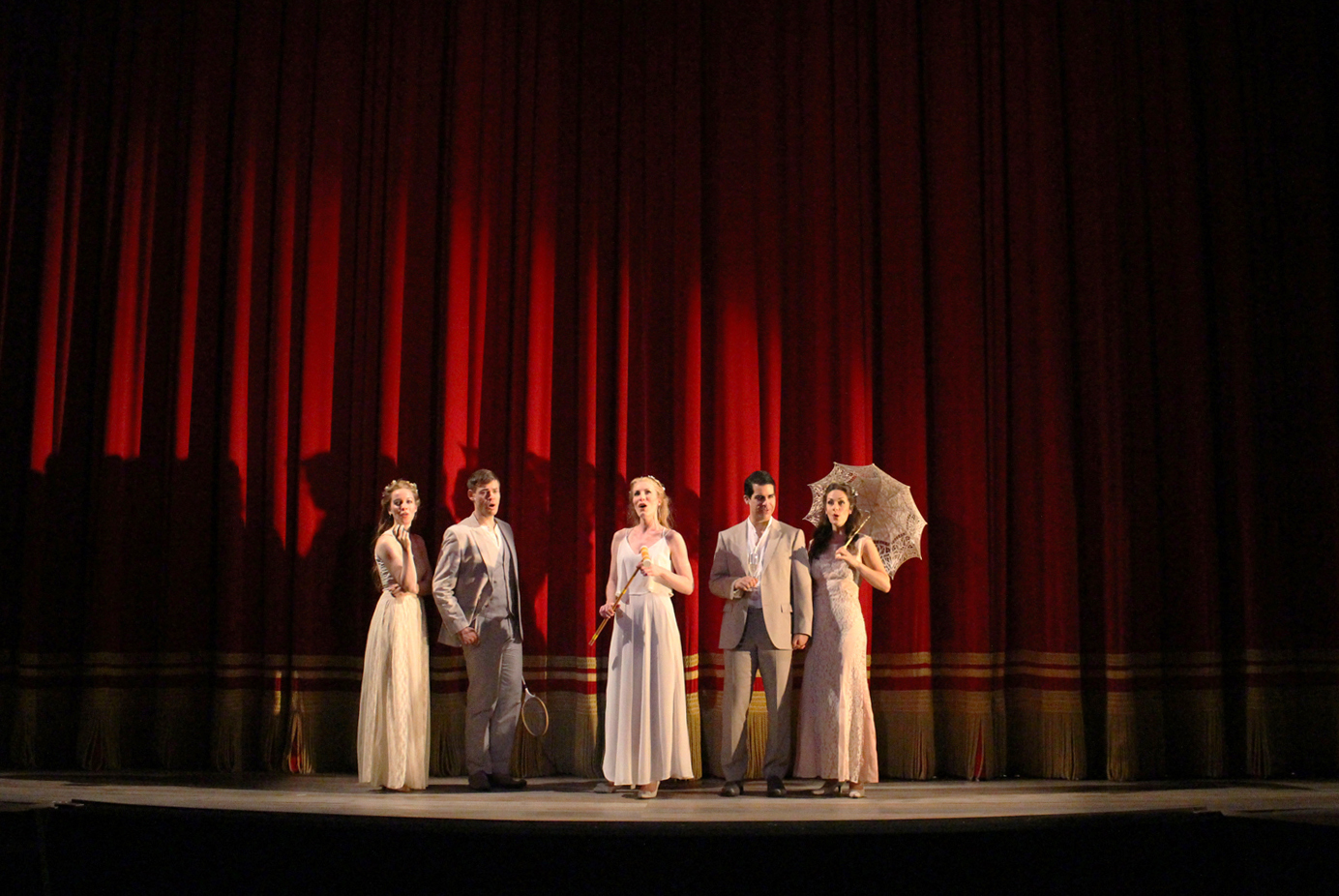 Act II also begins with Liebeslieder singers in front of red curtain