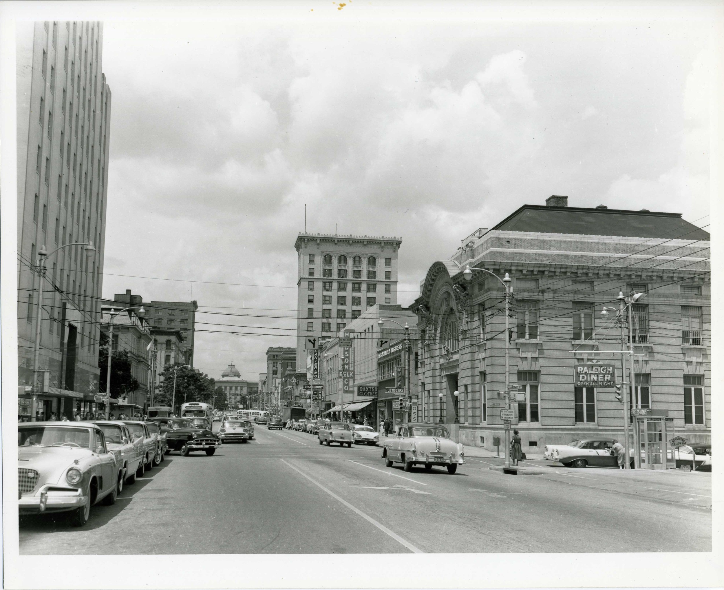 300 block of Fayetteville Street looking north to the State Capitol - Raleigh City Hall on the right. Photo ca. 1955 - Photo by Madlin Futrell. General Collection, State Archives of North Carolina