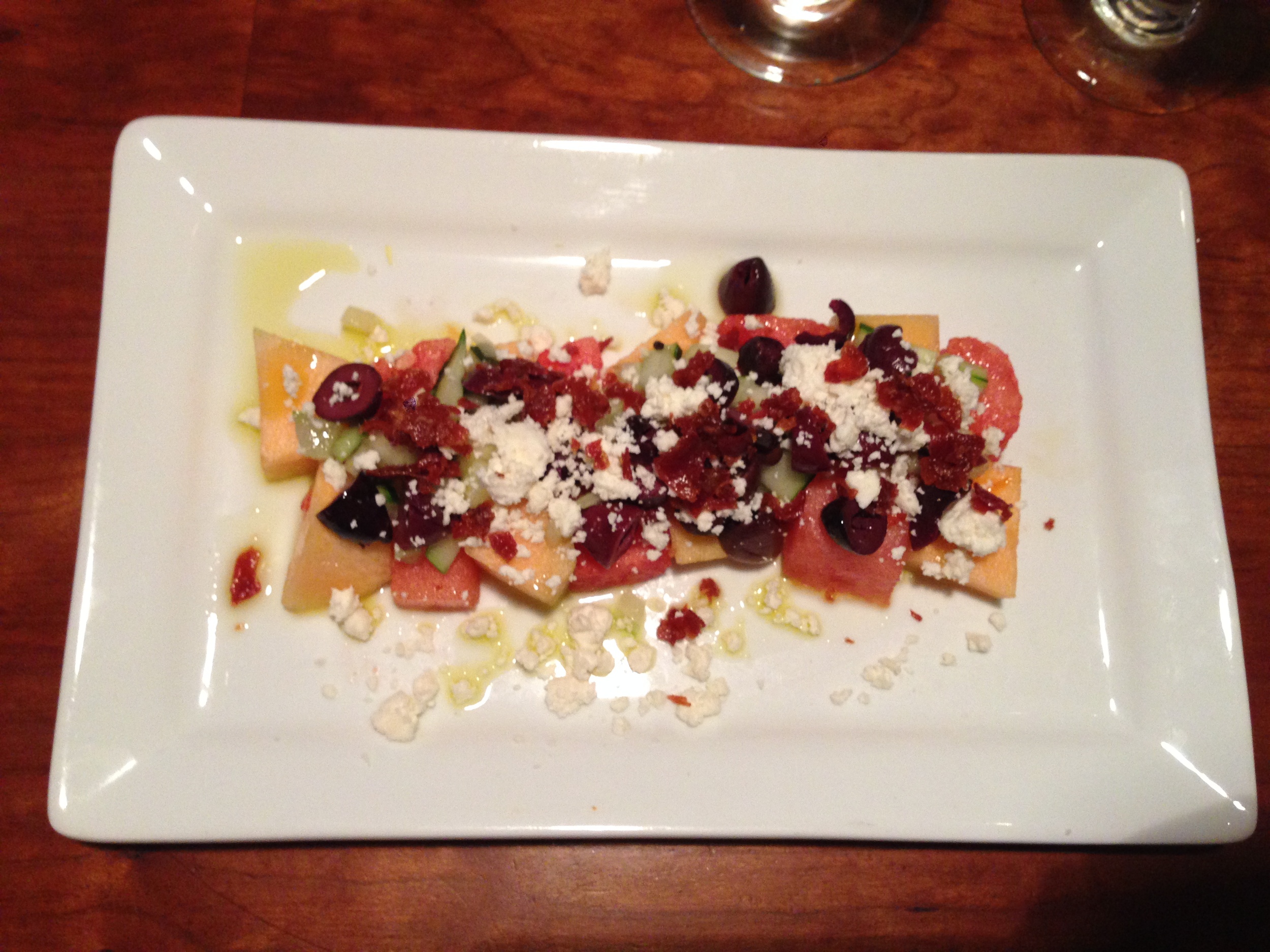 12.00
melon salad with goat cheese, olives, and mint