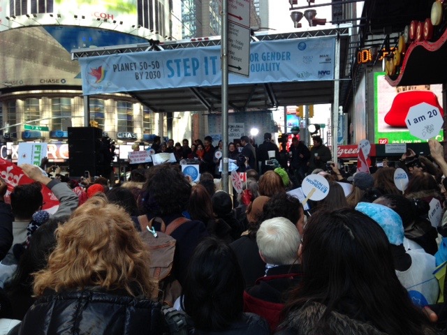 Int. women's Day march march 8 new yk from Un to times Square. 2 can flags are held by other cfuw delegates.jpg