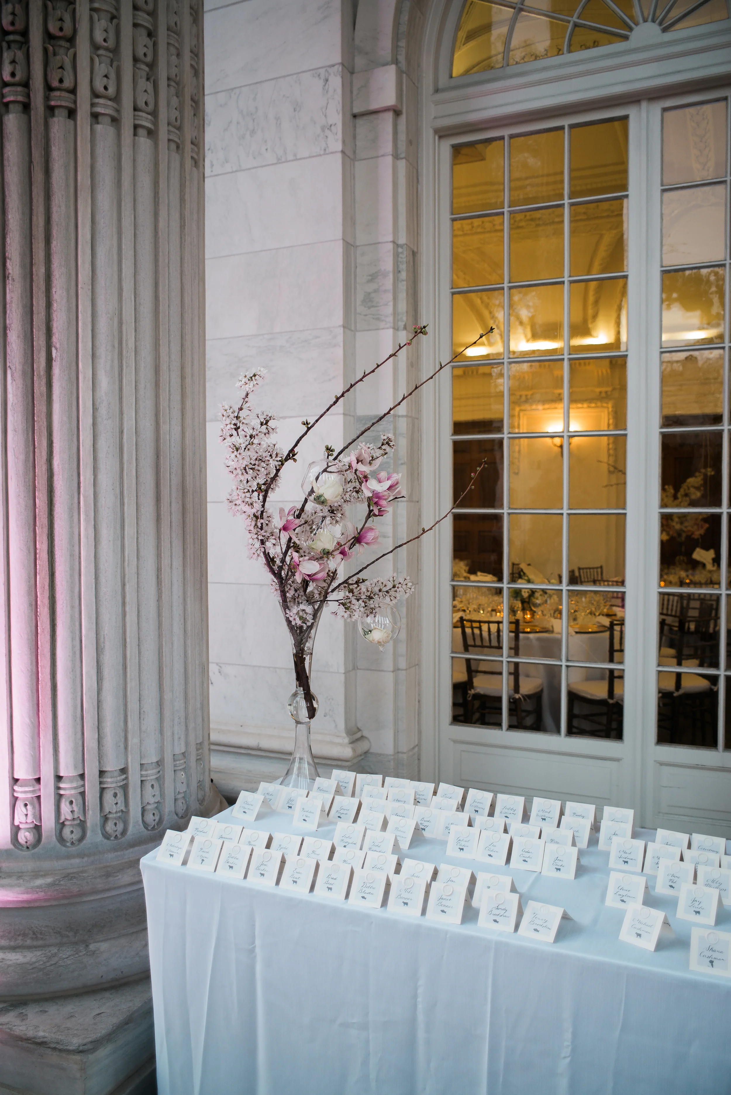 my team and I really loved creating these off center cherry blossom arrangements. So unique!