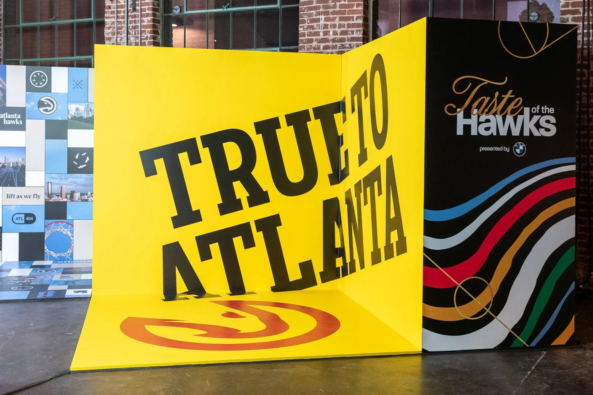 Custom branded event activation wall with dimensional graphics, bold signage, and photo-ready display.