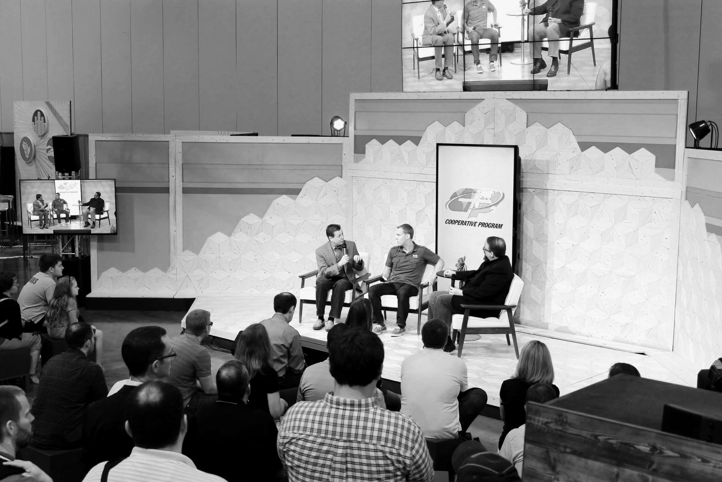 black-and-white-conference-stage-with-custom-scenic-backdrop.jpg