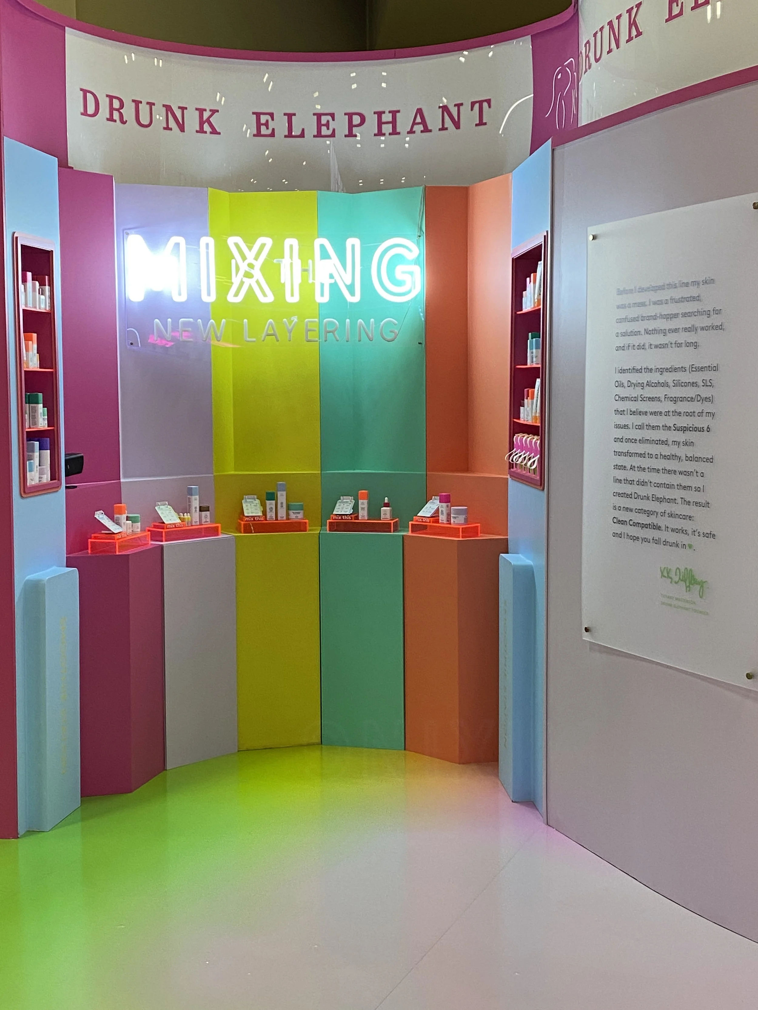 custom-product-sampling-display-with-colorful-pedestals-and-signage.JPG