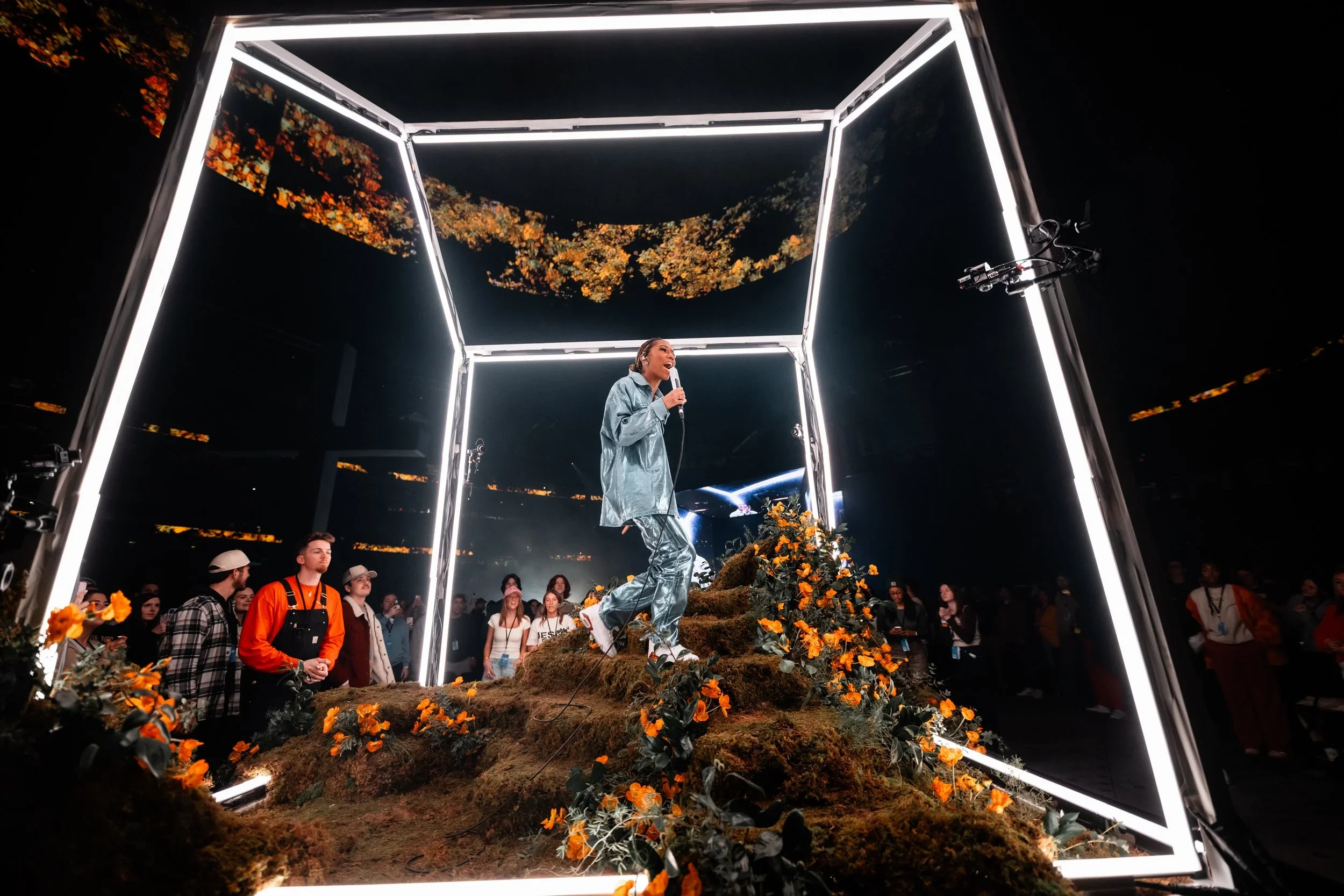 LED frame stage environment with custom scenic fabrication.