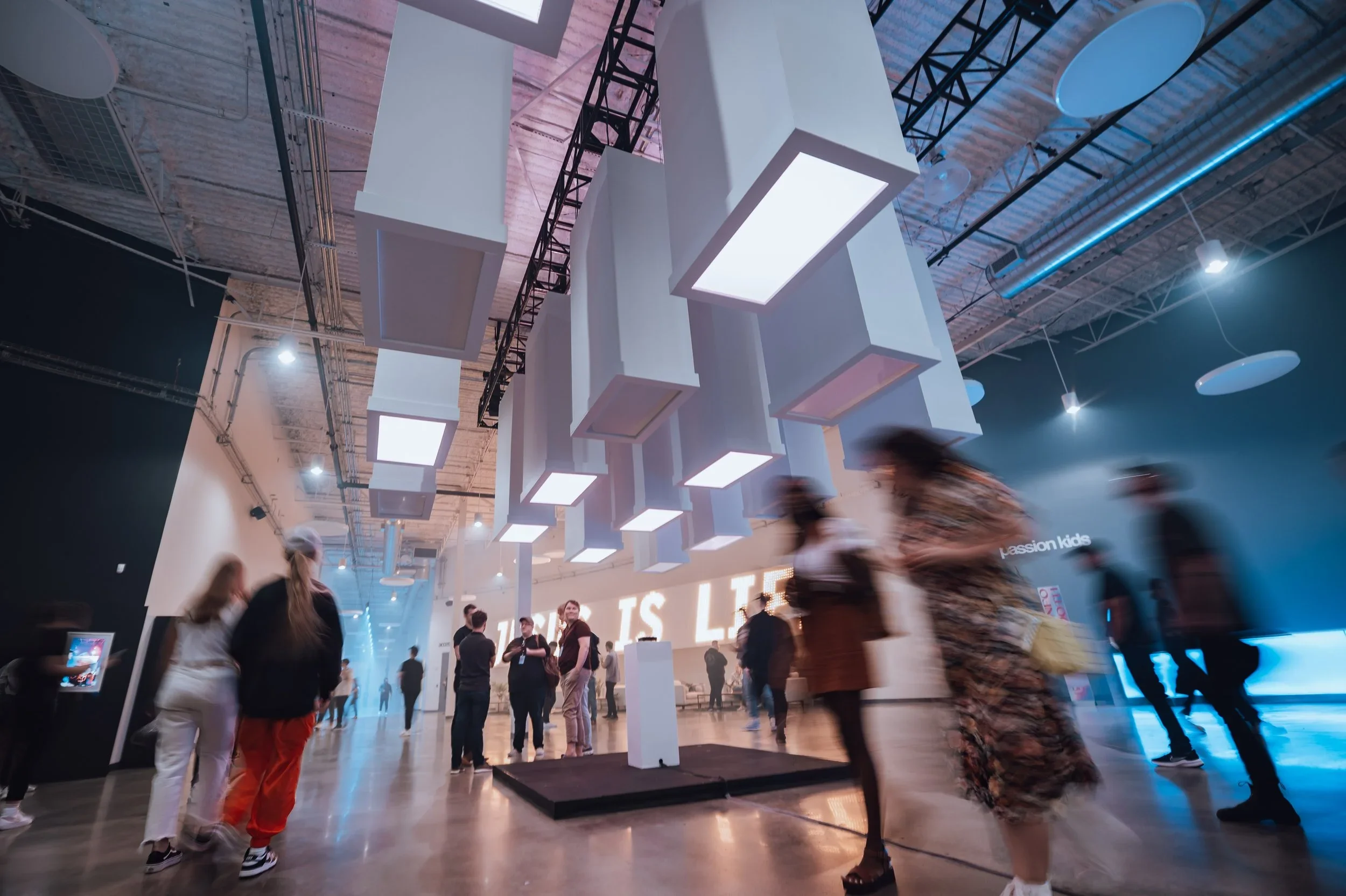 Suspended cube lighting installation for immersive interactive event environment.