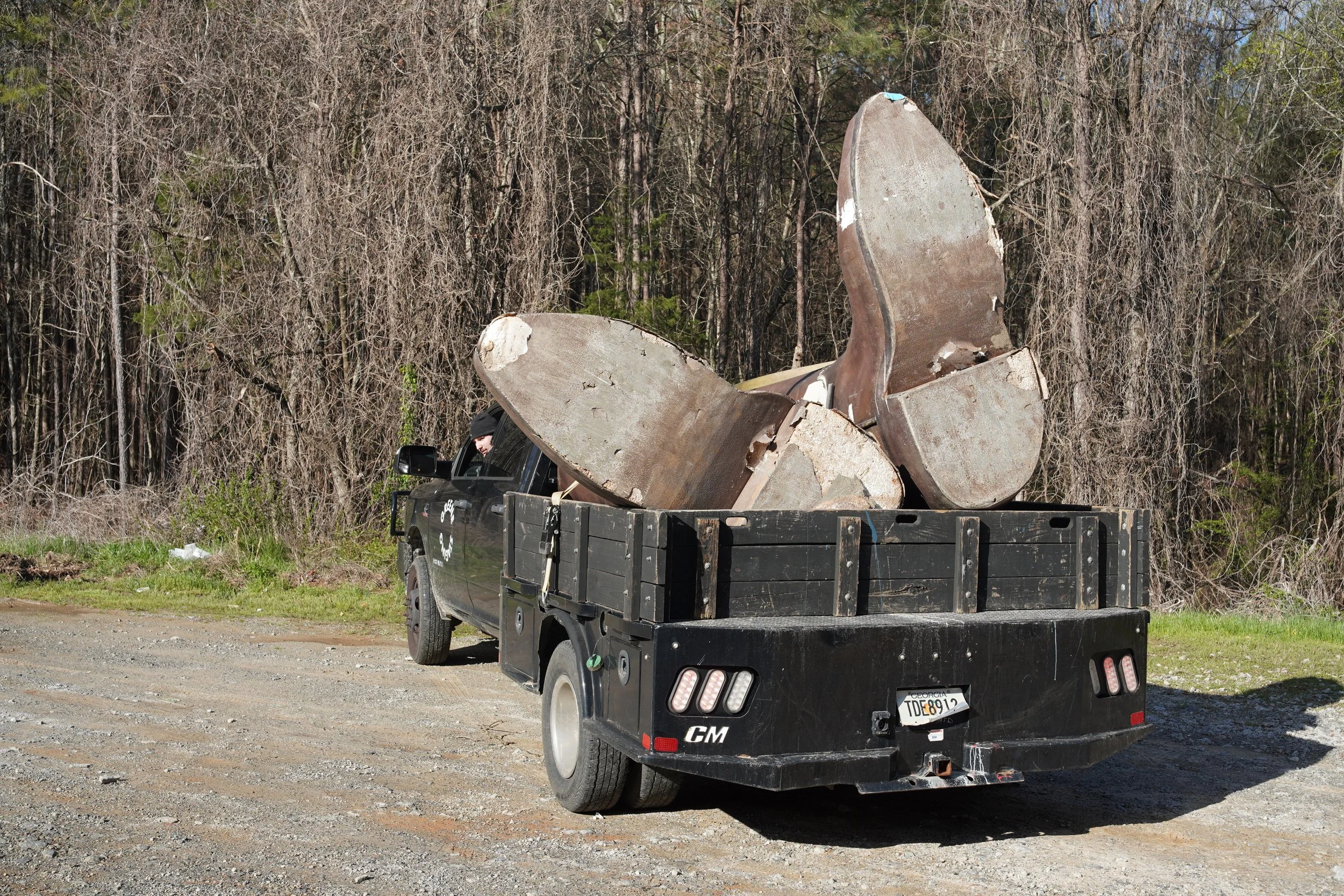 Oversized custom prop pieces being transported from the GREENE fabrication shop for installation.