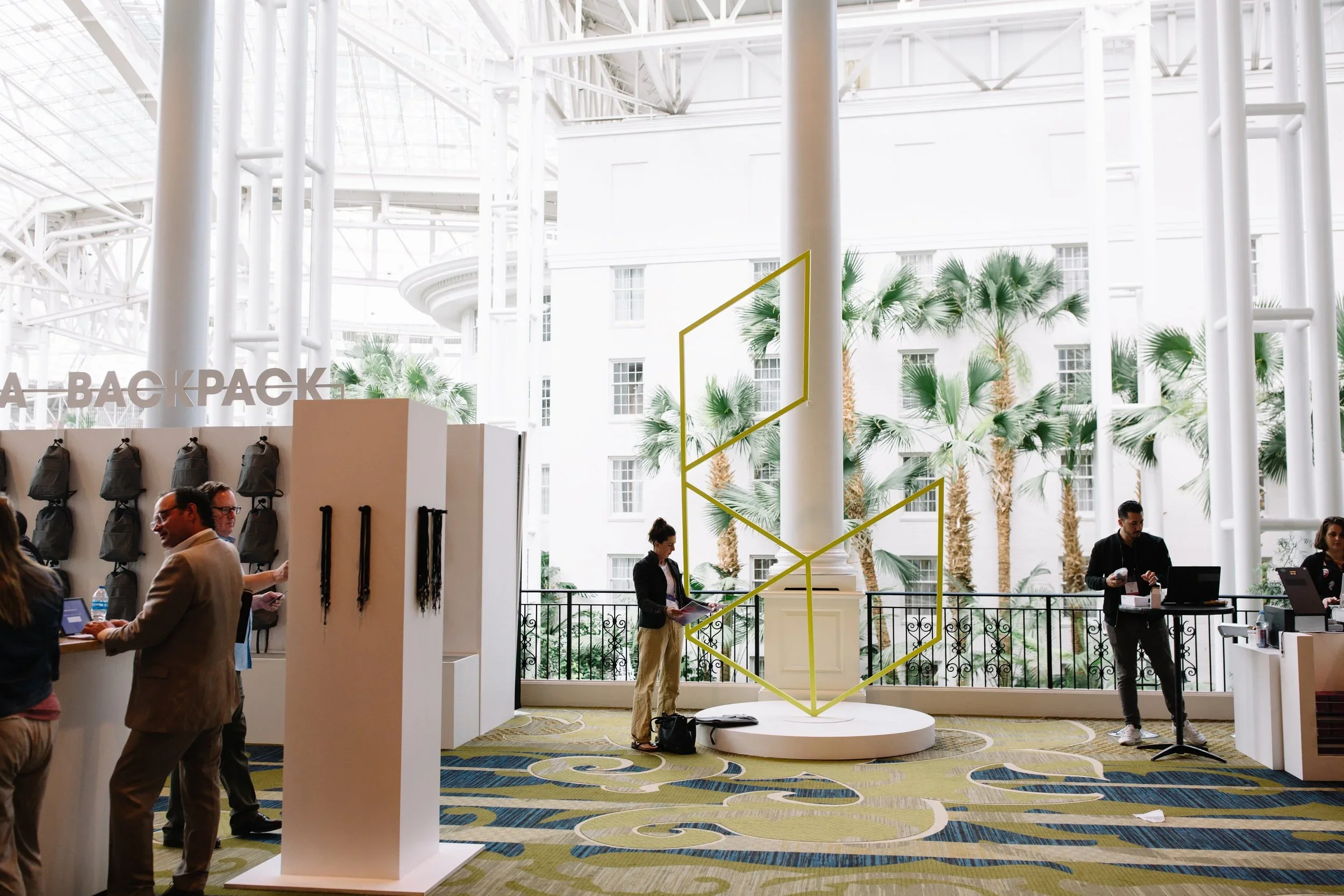 Corporate event display with custom podiums, scenic signage, and branded presentation area.