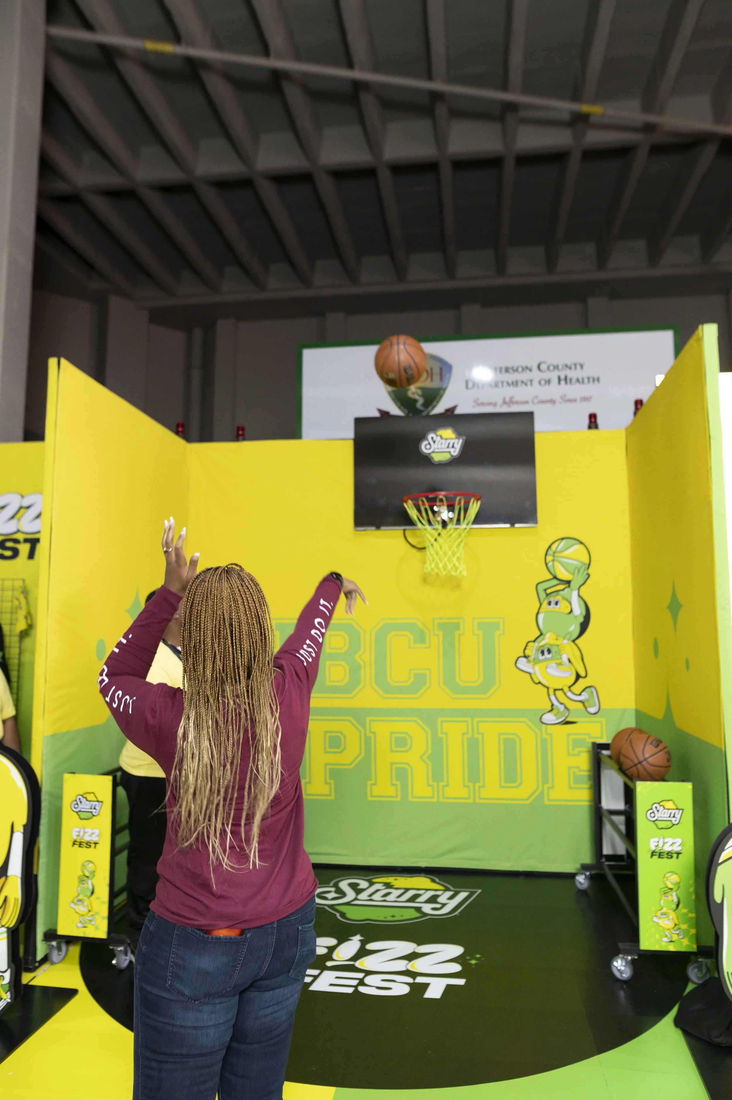 Branded basketball arcade game with custom graphics for interactive event activation.